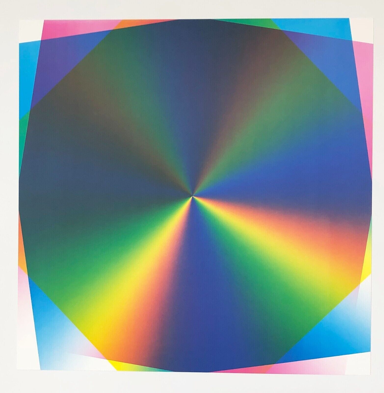 A picture of a rainbow colored circle in a white frame.