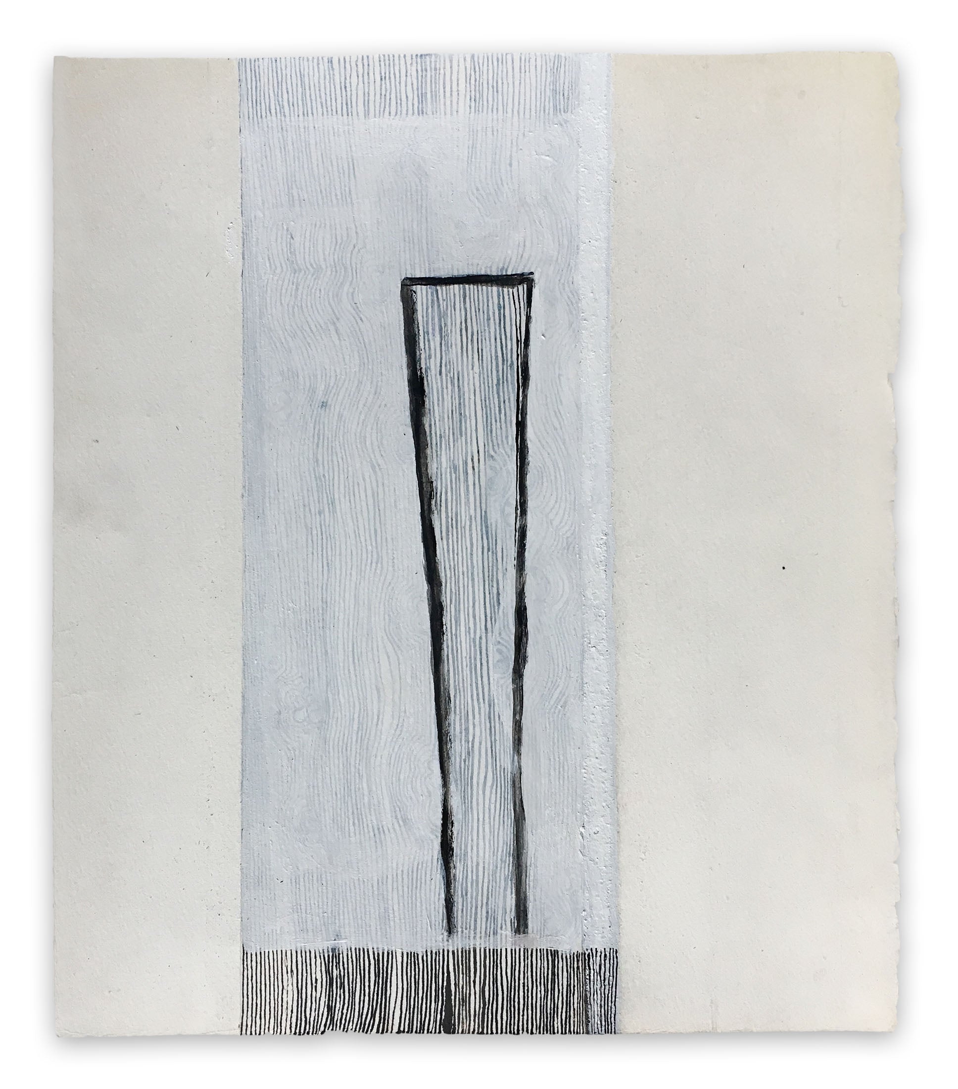 A piece of paper with a black and white drawing on it.