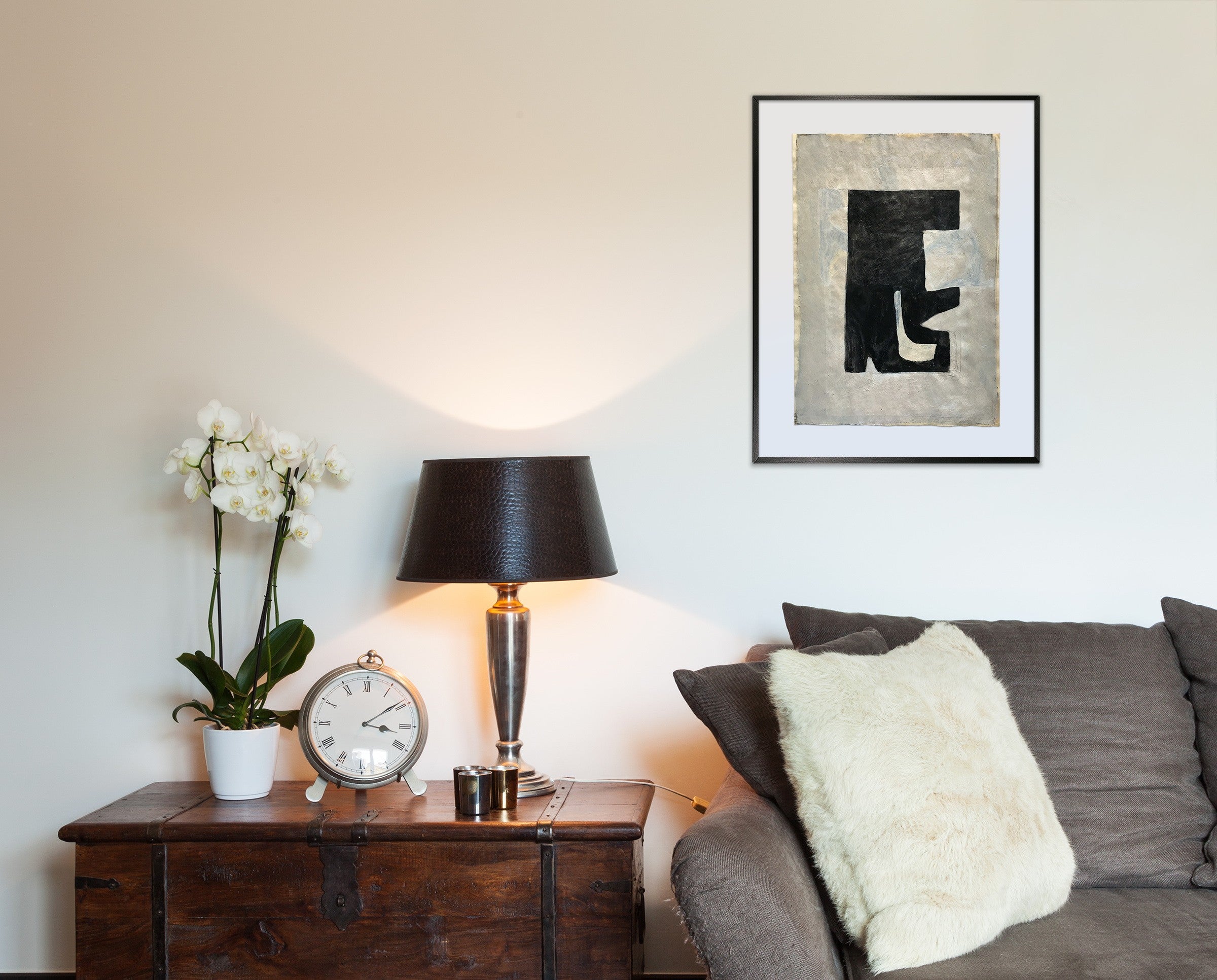 A black and white painting on a piece of paper.