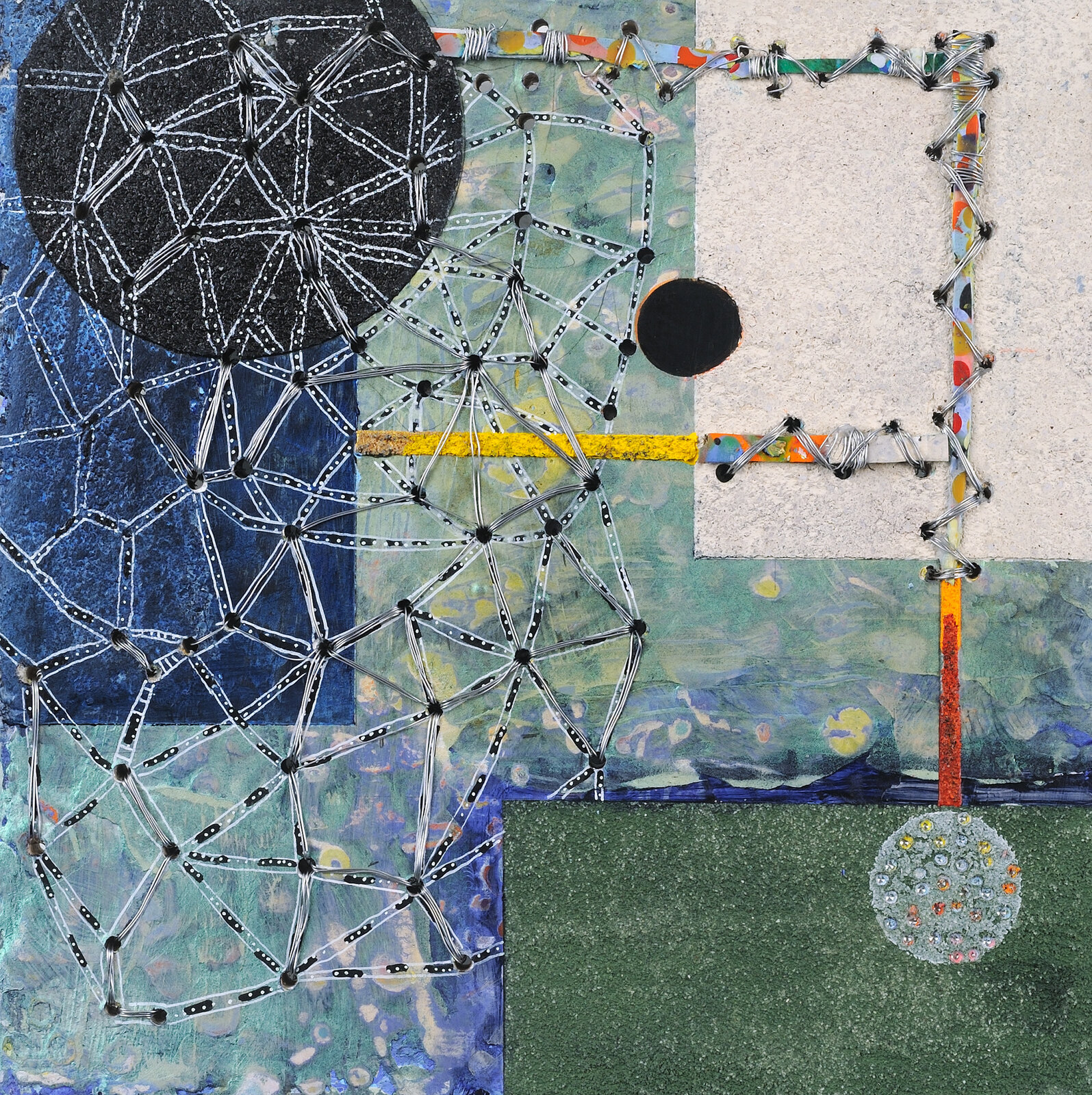 A collage of various pieces of art on a piece of paper.