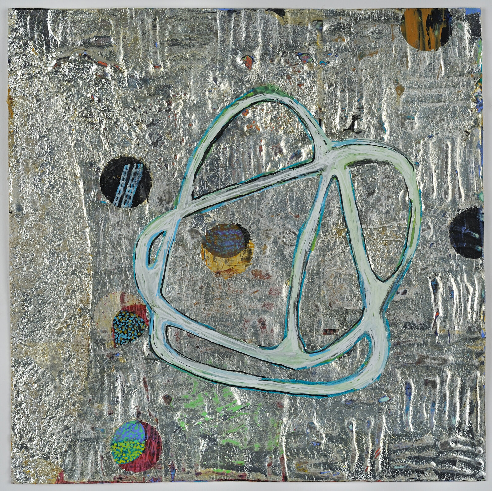 A painting on a piece of metal with a blue circle on it.