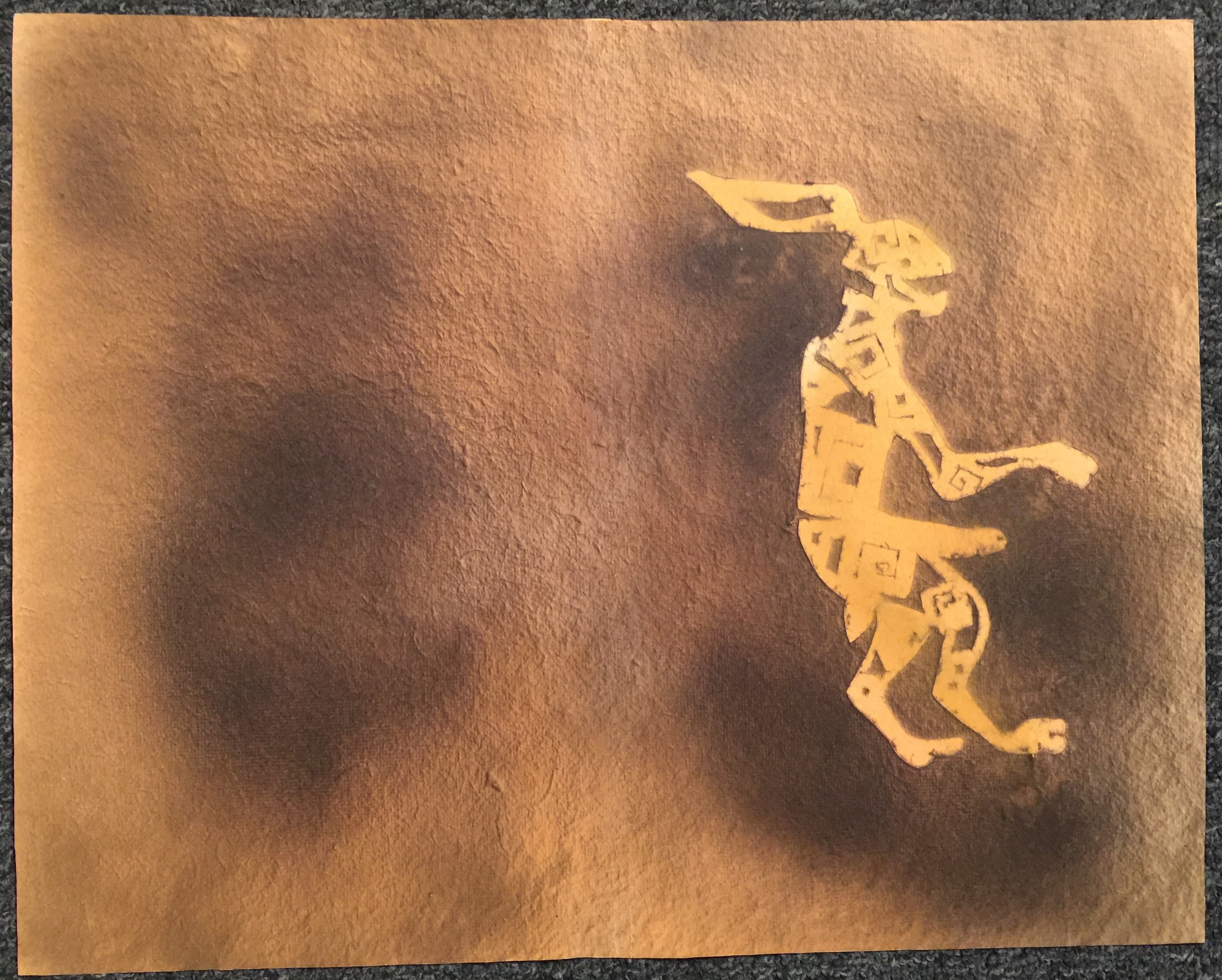 A piece of paper with a drawing of a man on it.