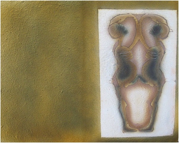 A painting of a woman's torso on a yellow wall.