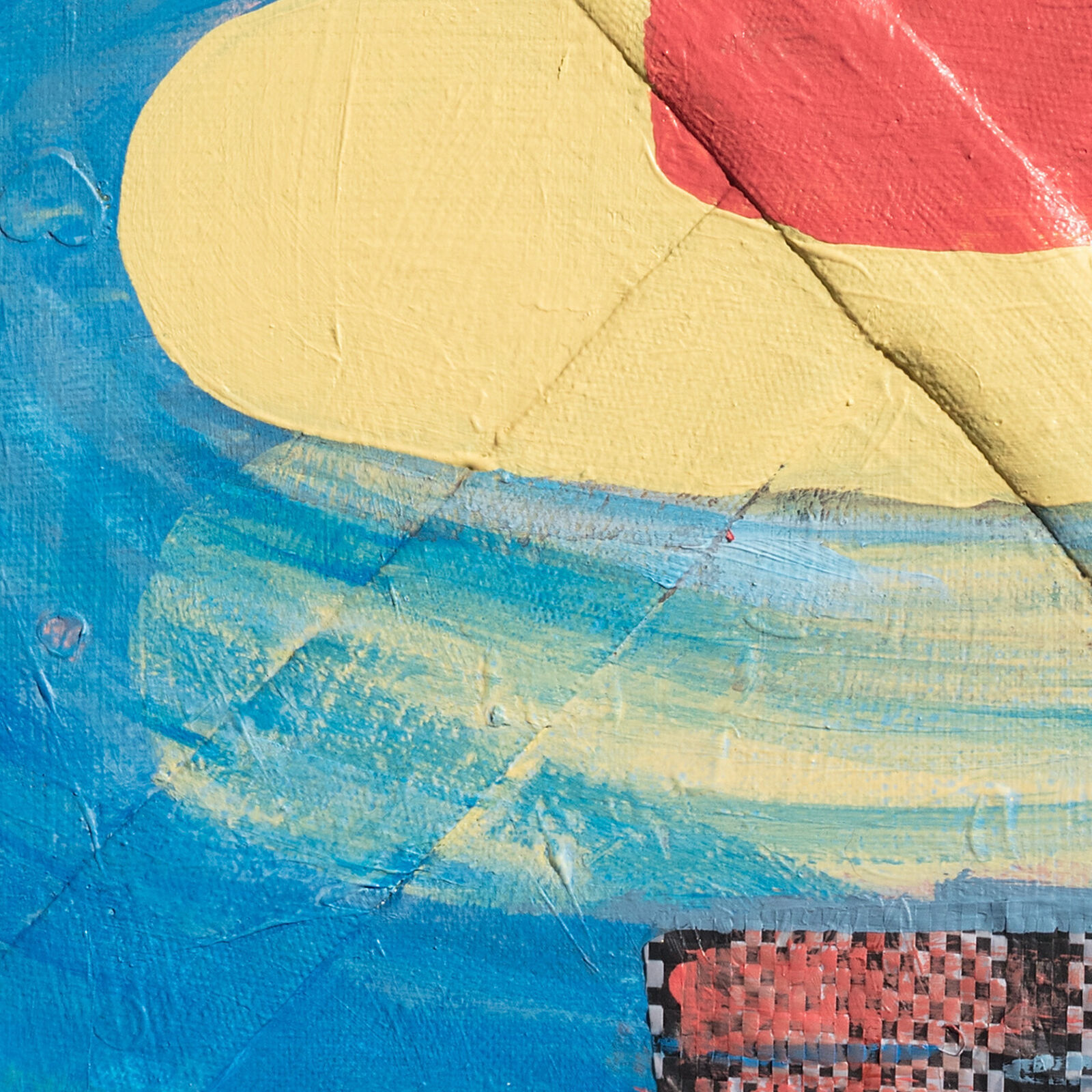 A painting of a person in a red hoodie floating in the water.