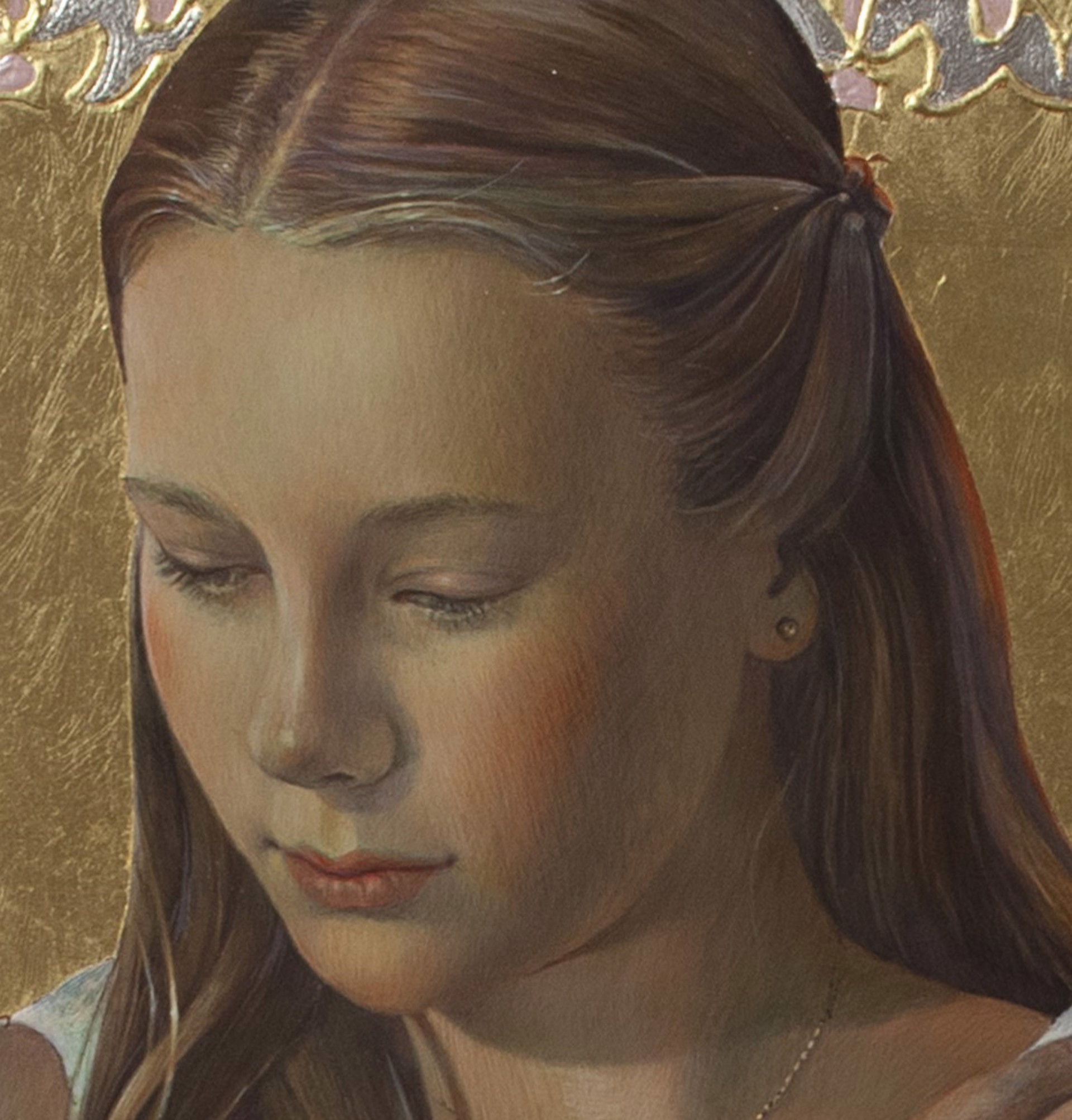 A serene portrait of a young figure in a patterned dress, framed by an ornate golden border.