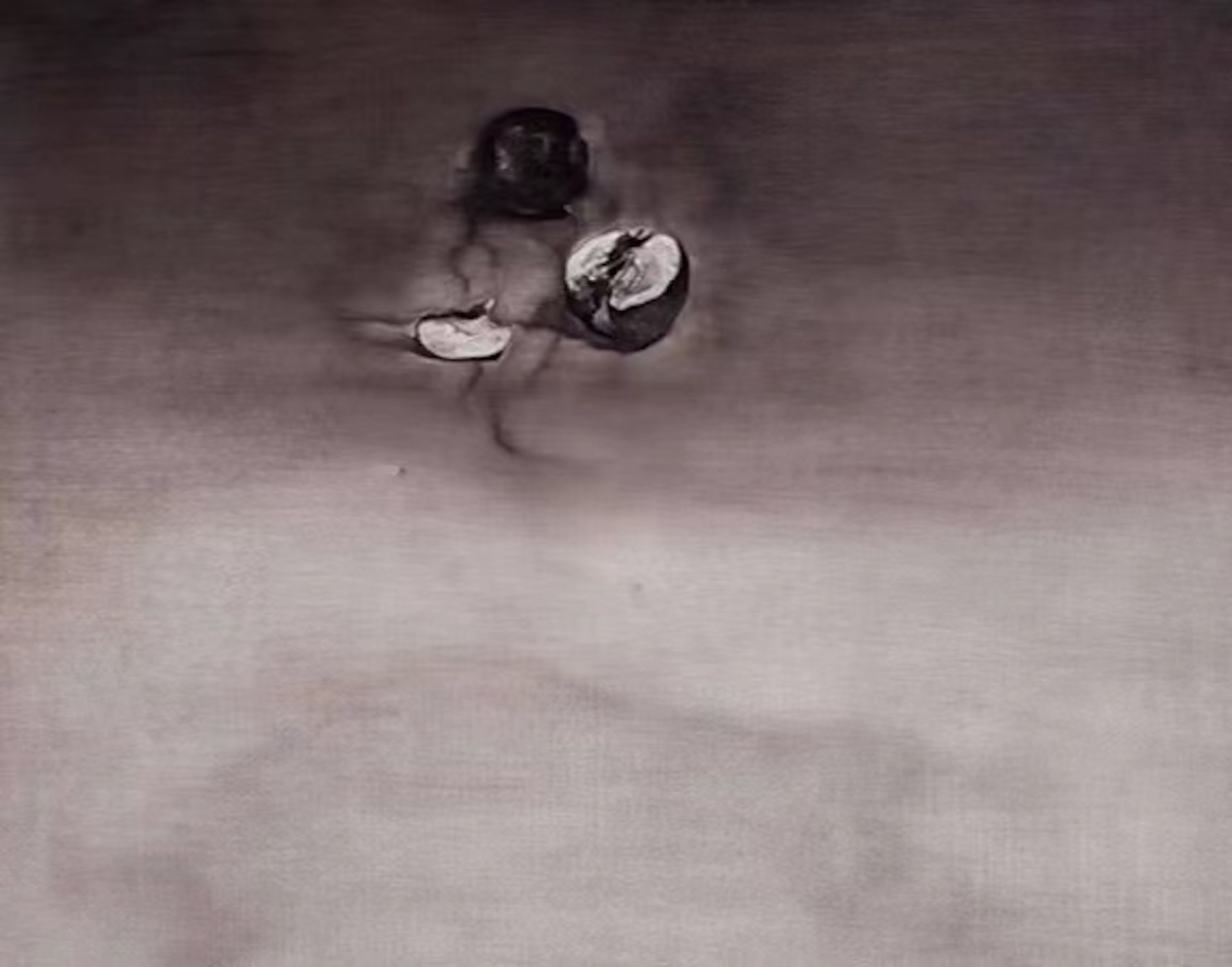 A black and white photo of a person standing in the snow.