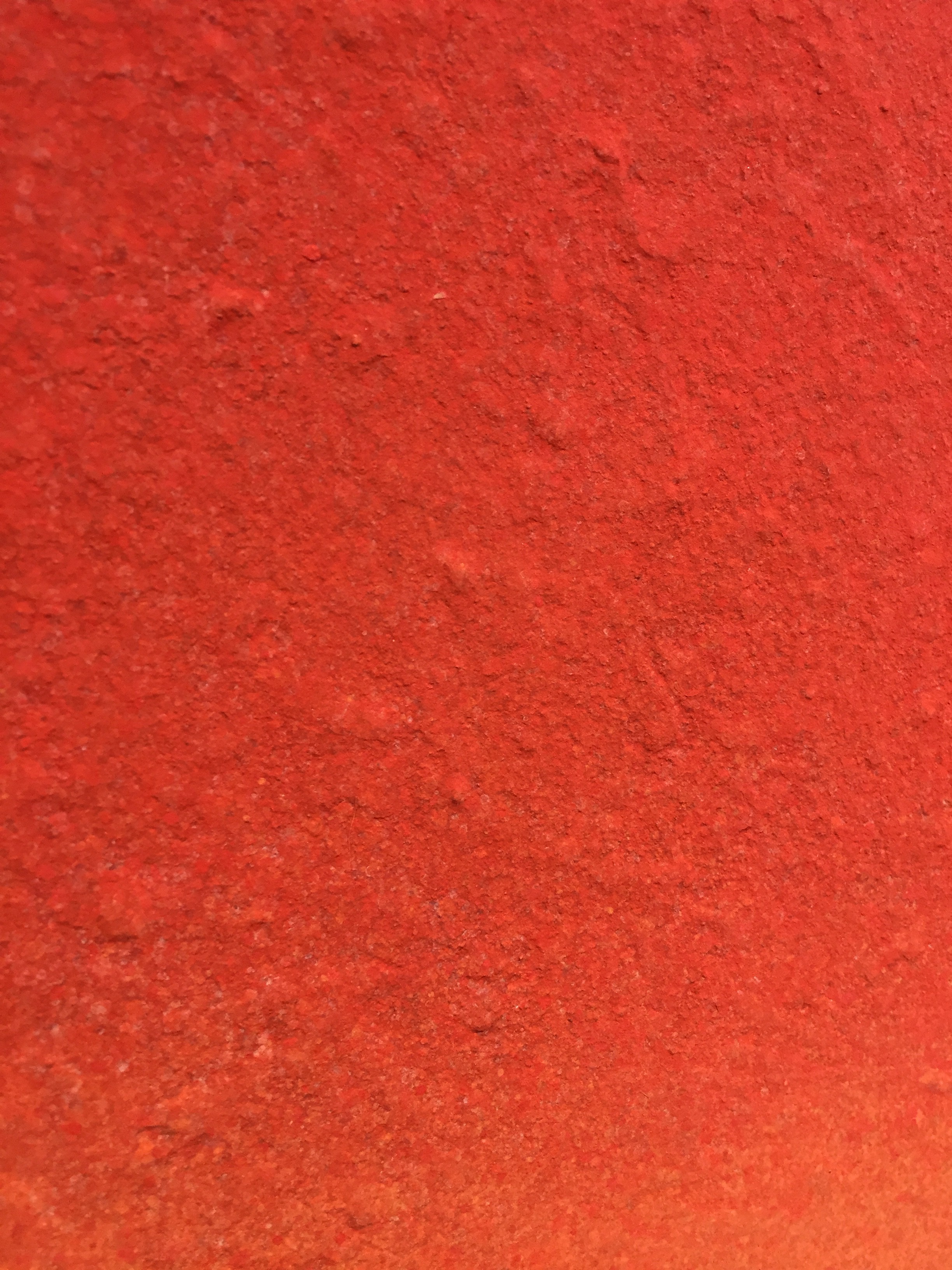 A painting hanging on a wall in a room.