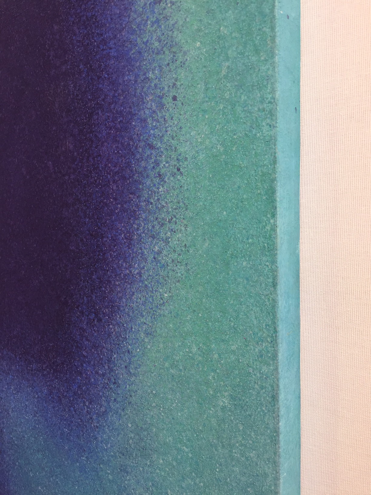A painting hanging on a wall in a room.