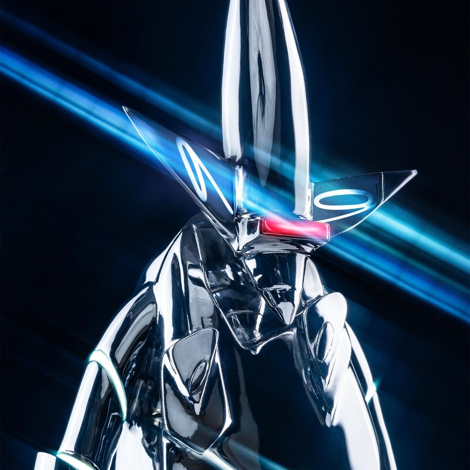 A futuristic robot standing in front of a black background.