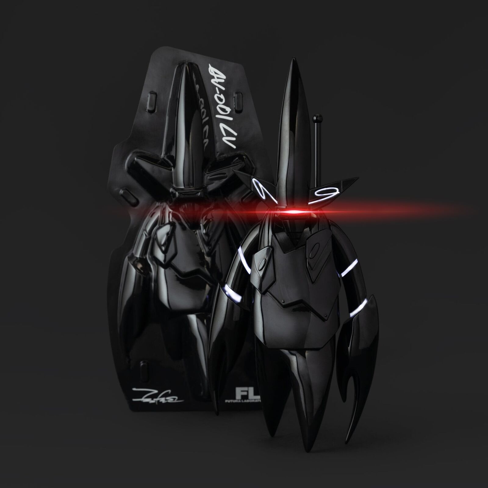 A black and red robot with a red light on it's head.