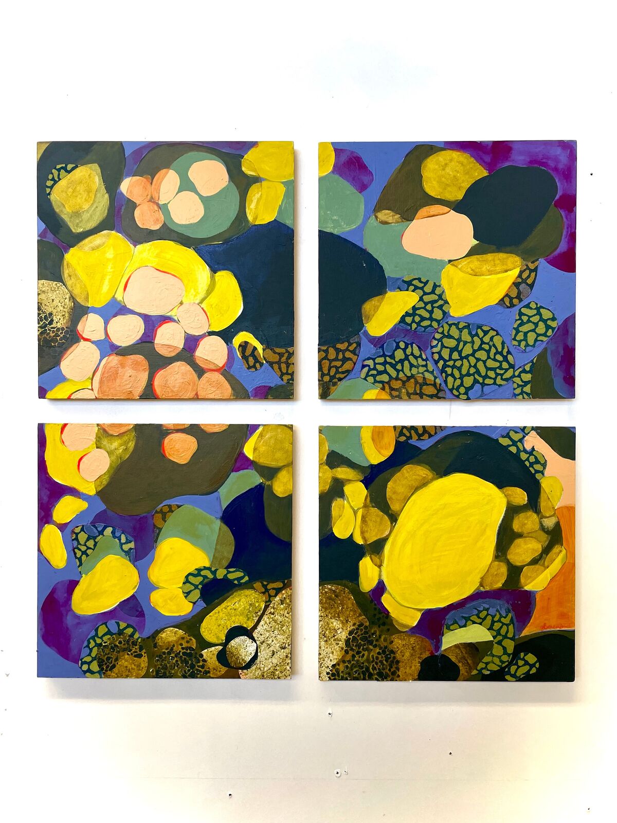A vibrant four-panel abstract composition featuring organic shapes and bold colors.