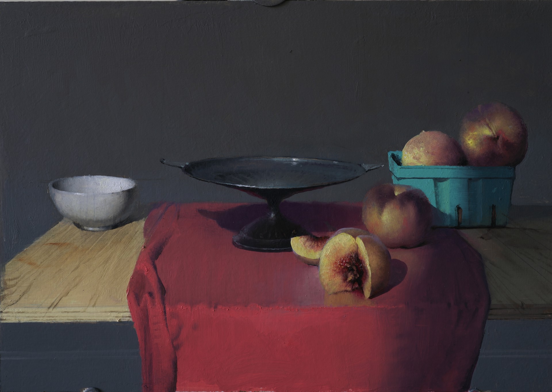 A still life painting featuring a bowl, a pedestal dish, and peaches on a table with a red cloth.
