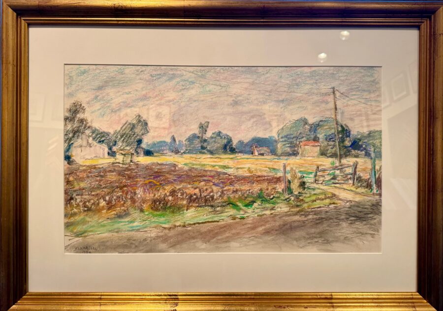 A framed pastel landscape of a rural field with a dirt road in the foreground.