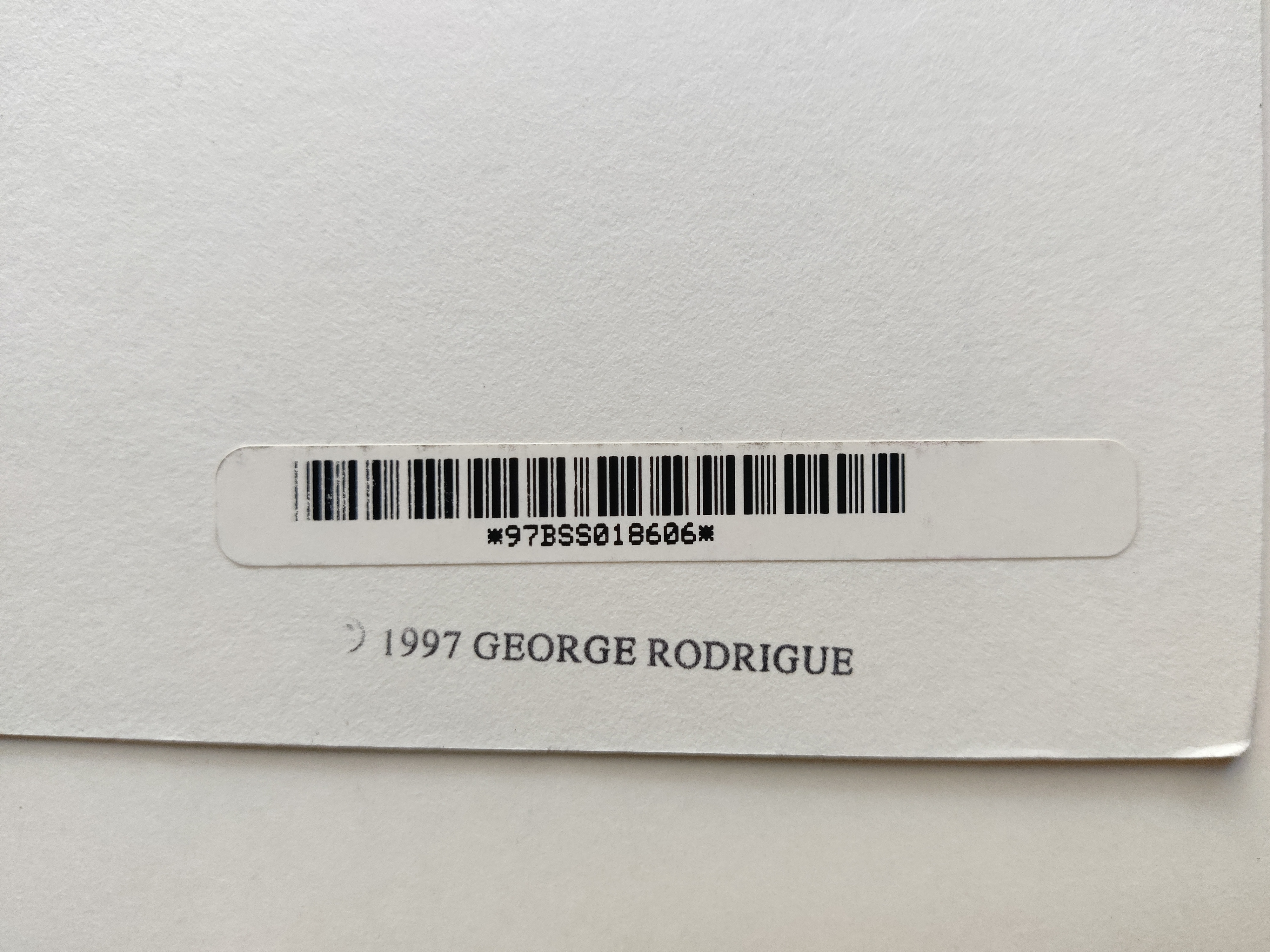 A poster of a blue dog wearing a colorful mask.