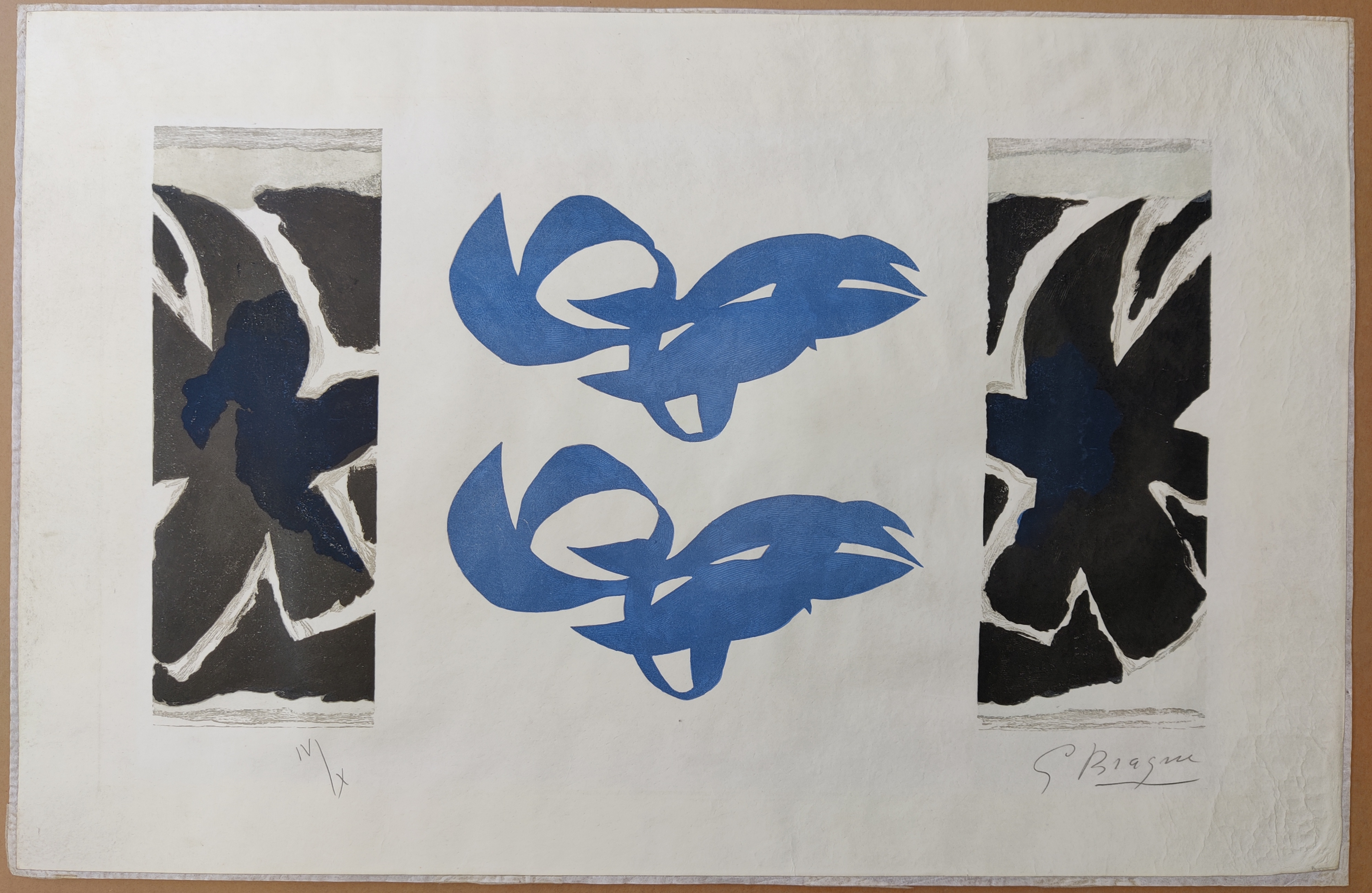 A blue and black print on a piece of paper.