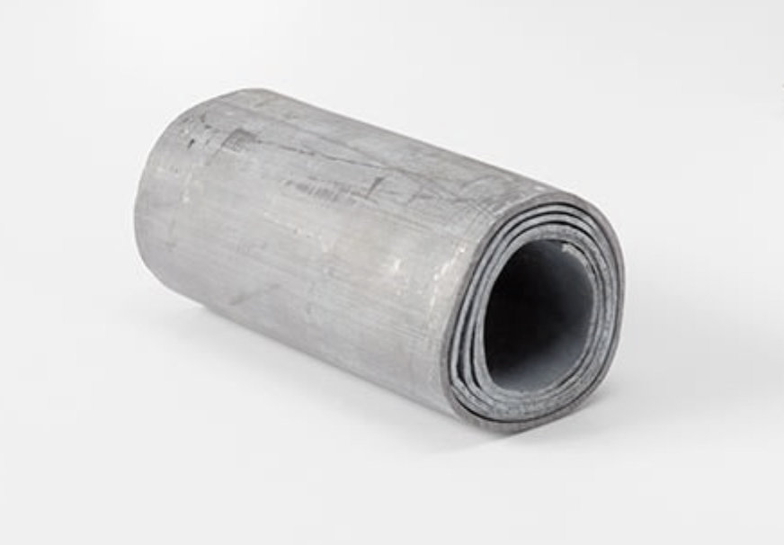A minimalist composition featuring a rolled-up grey mat against a stark white background.