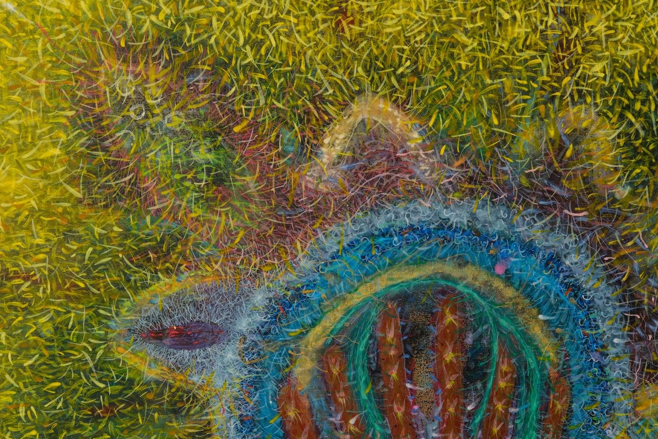 A textured, psychedelic portrait of a face emerging from a vibrant yellow field.