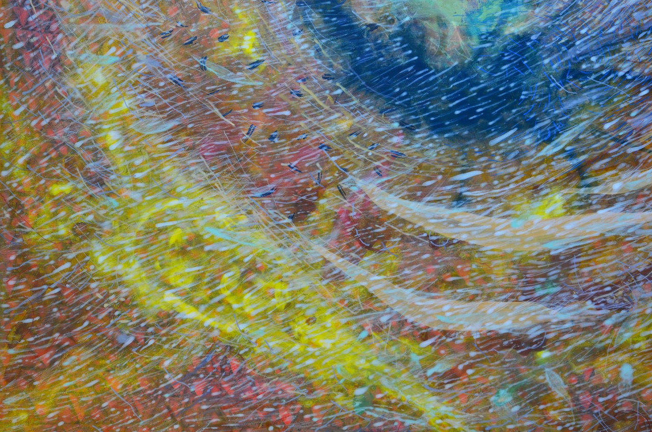 An abstract composition of swirling, colorful brushstrokes creating a dynamic and energetic visual experience.
