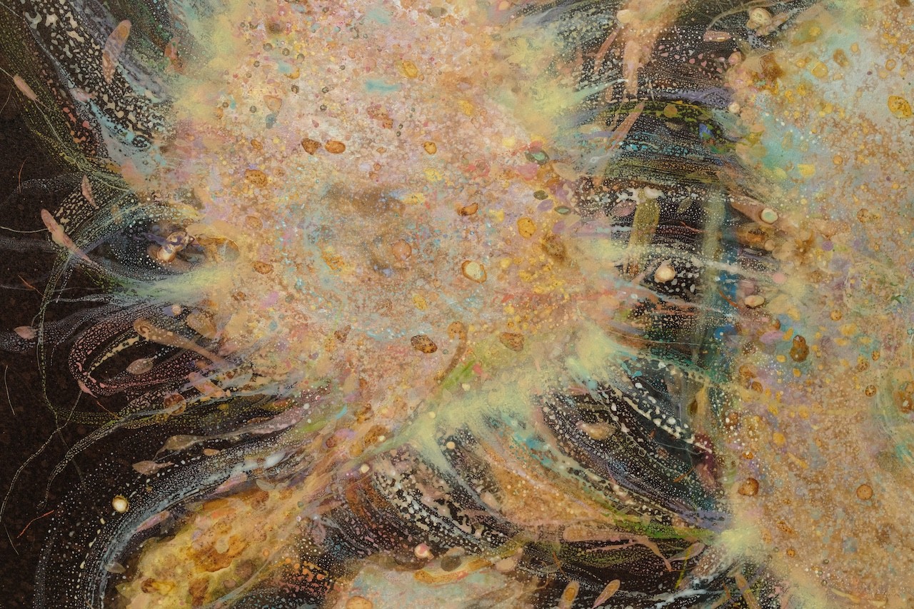 An abstract, textured composition featuring a central dark form surrounded by splattered gold and earthy tones.