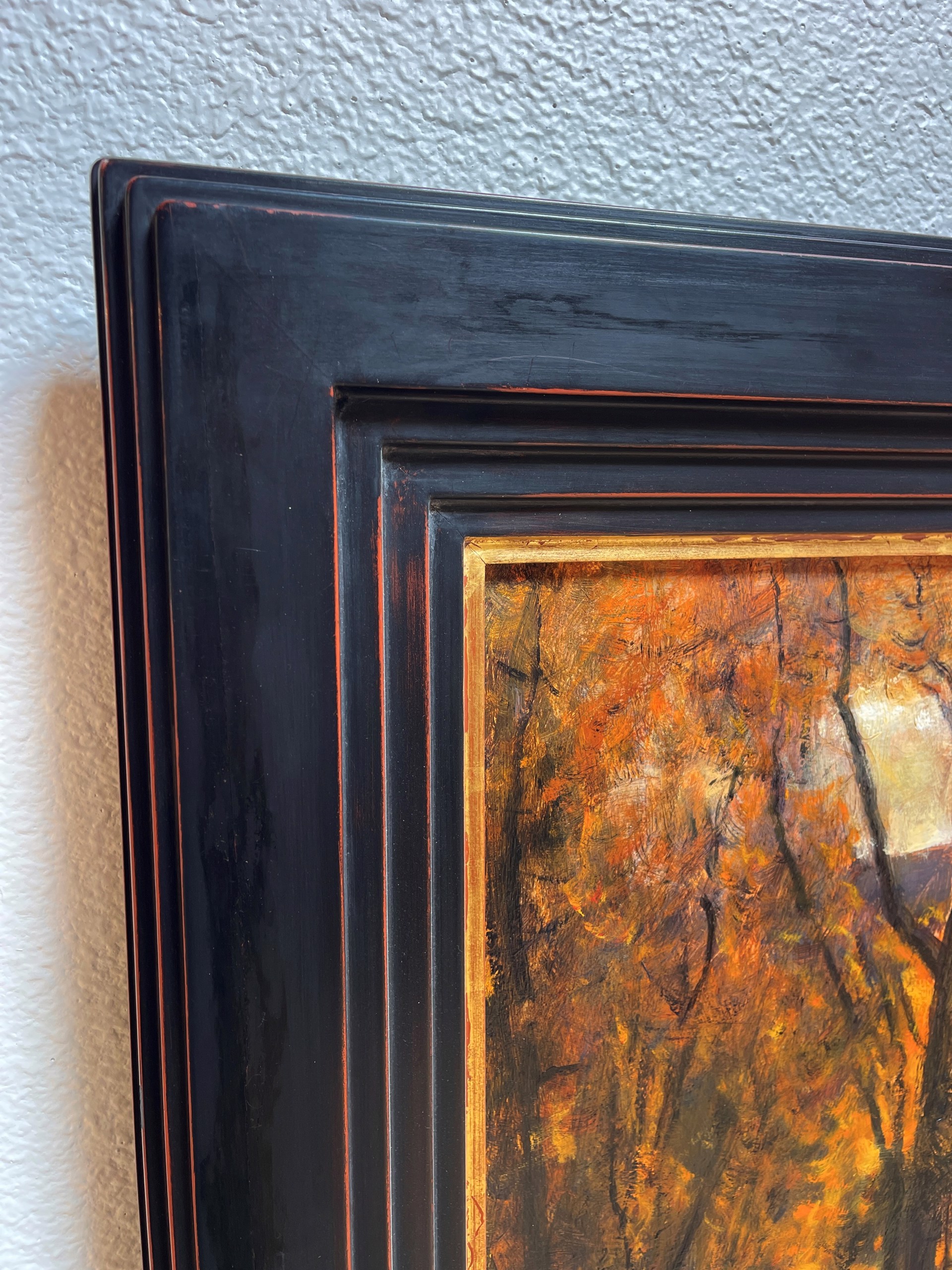 A painting of a river in the middle of a forest.