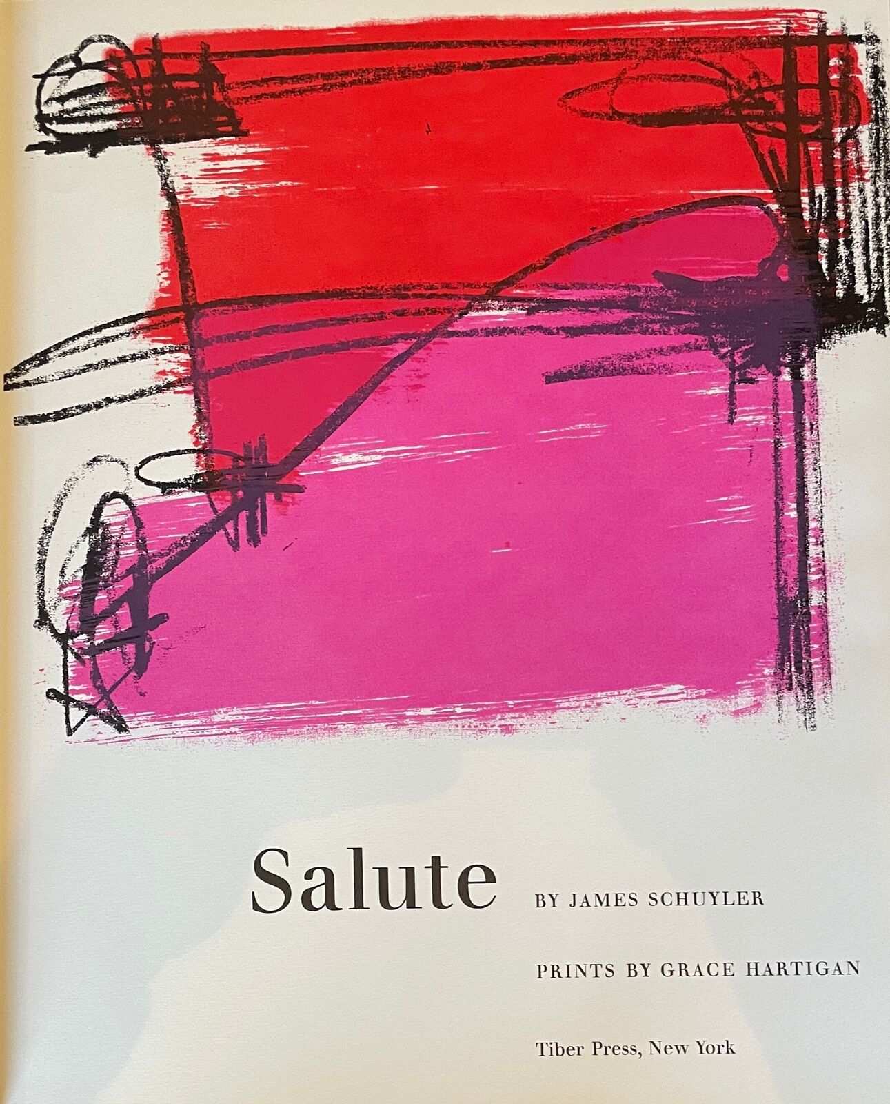 A set of four books with different colored covers.