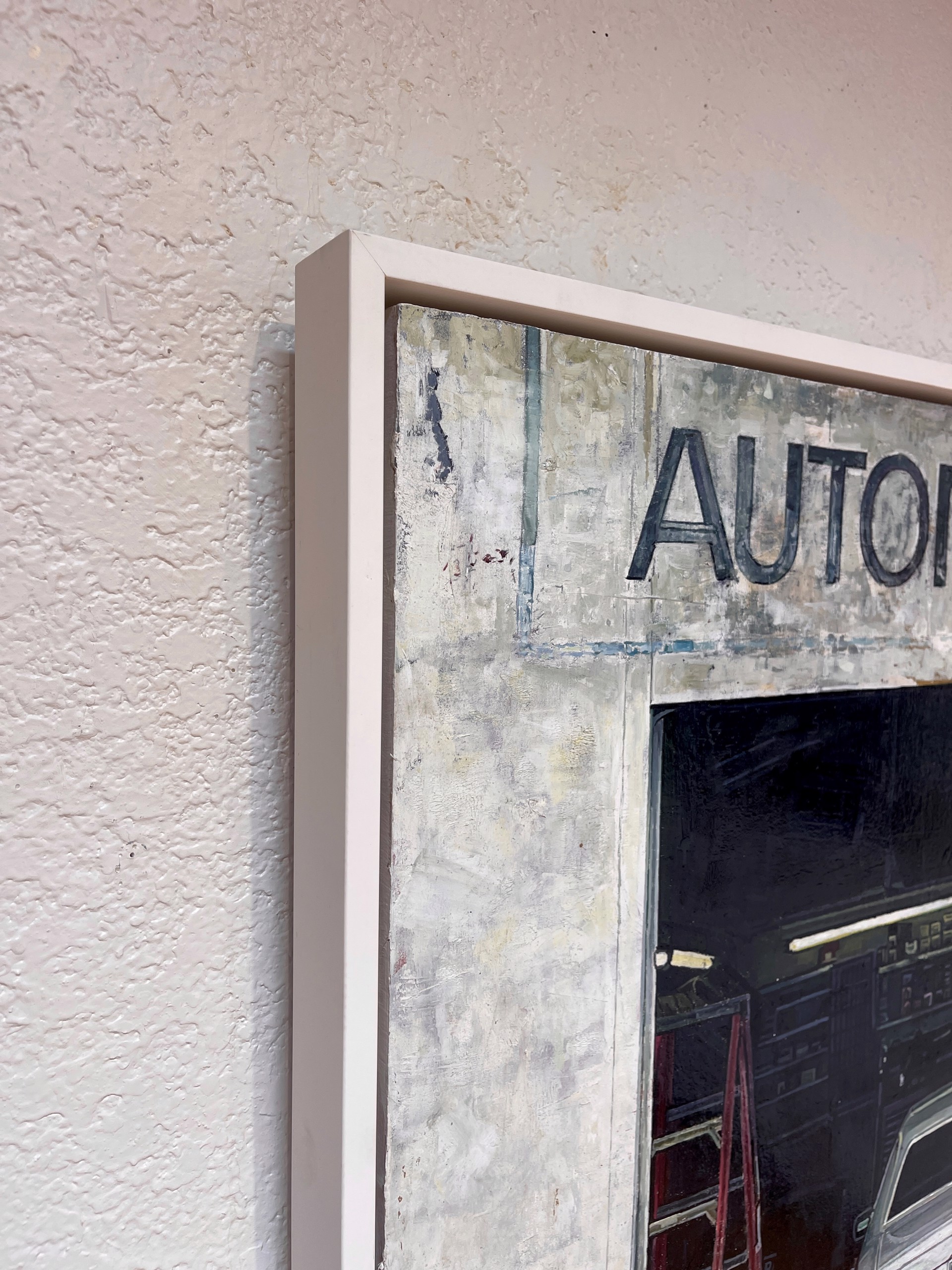 A realistic painting of a white sedan parked inside an open garage with visible signage above.