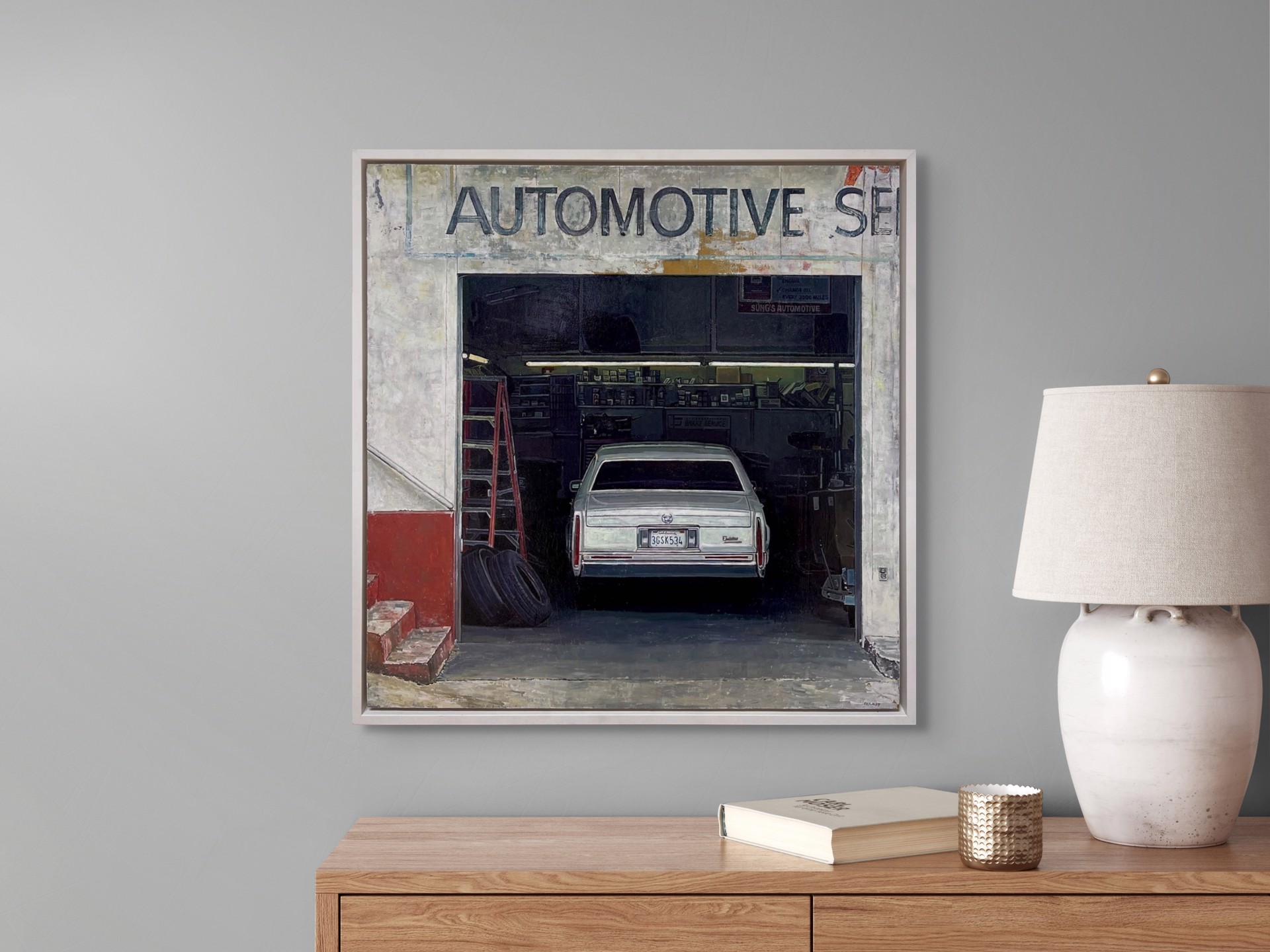A realistic painting of a white sedan parked inside an open garage with visible signage above.