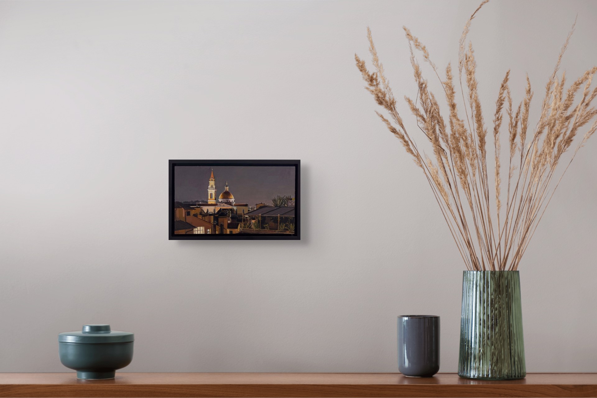 A painting of a city at night with a church in the background.