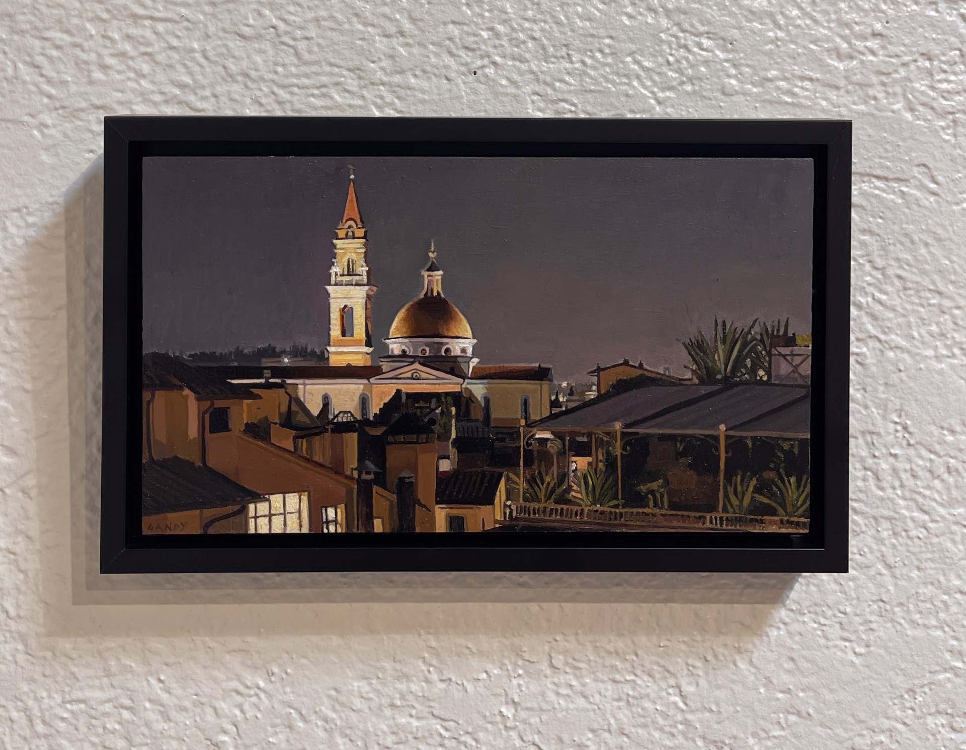 A painting of a city at night with a church in the background.