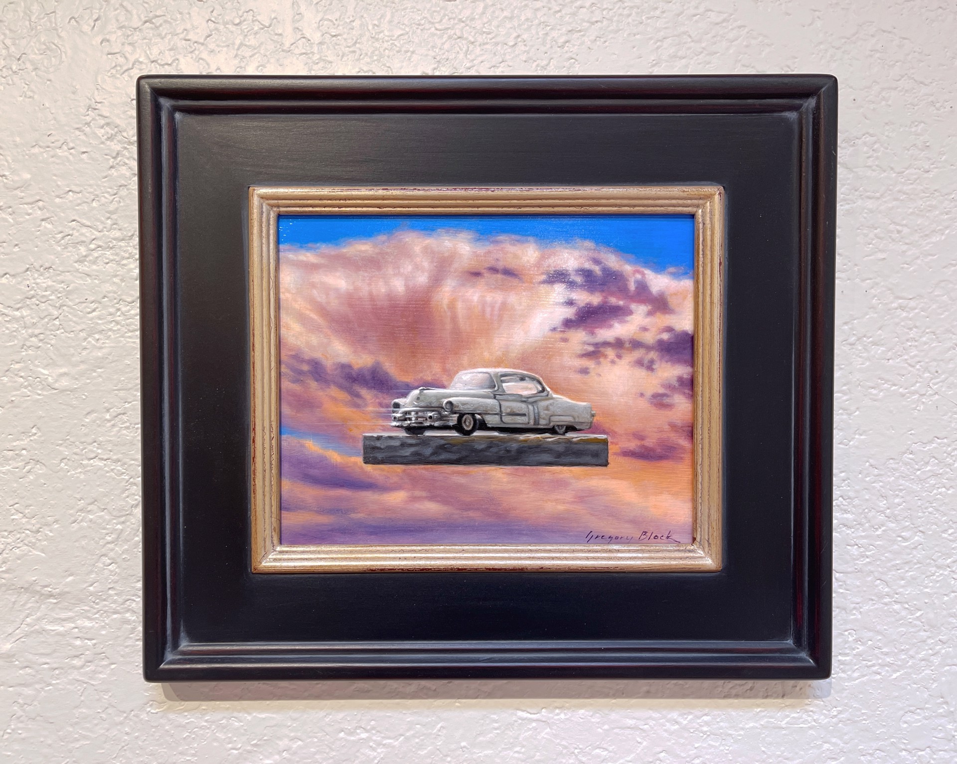 A painting of an old car sitting on top of a wooden block.