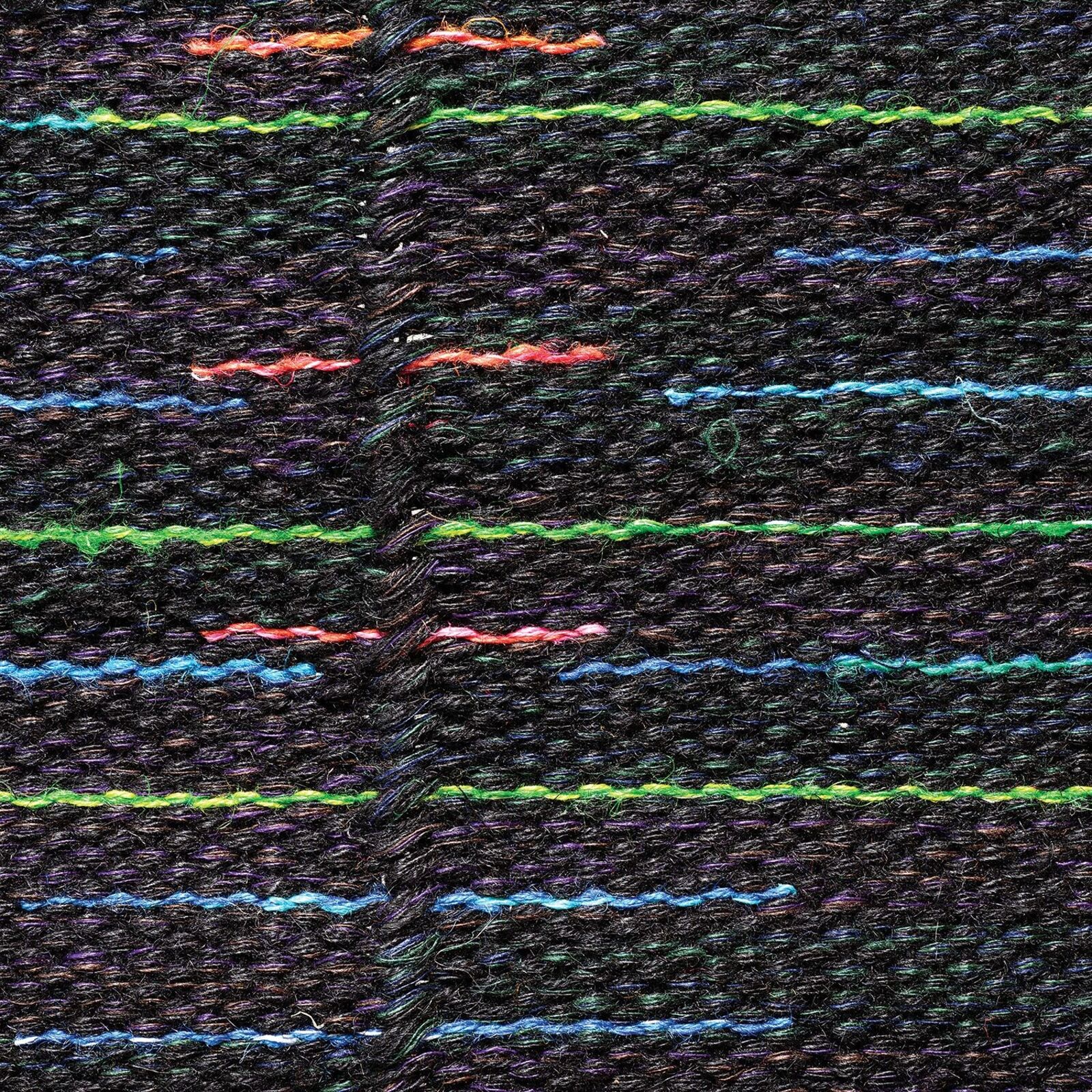 A woven textile featuring a dark background with colorful horizontal lines forming an abstract figure.