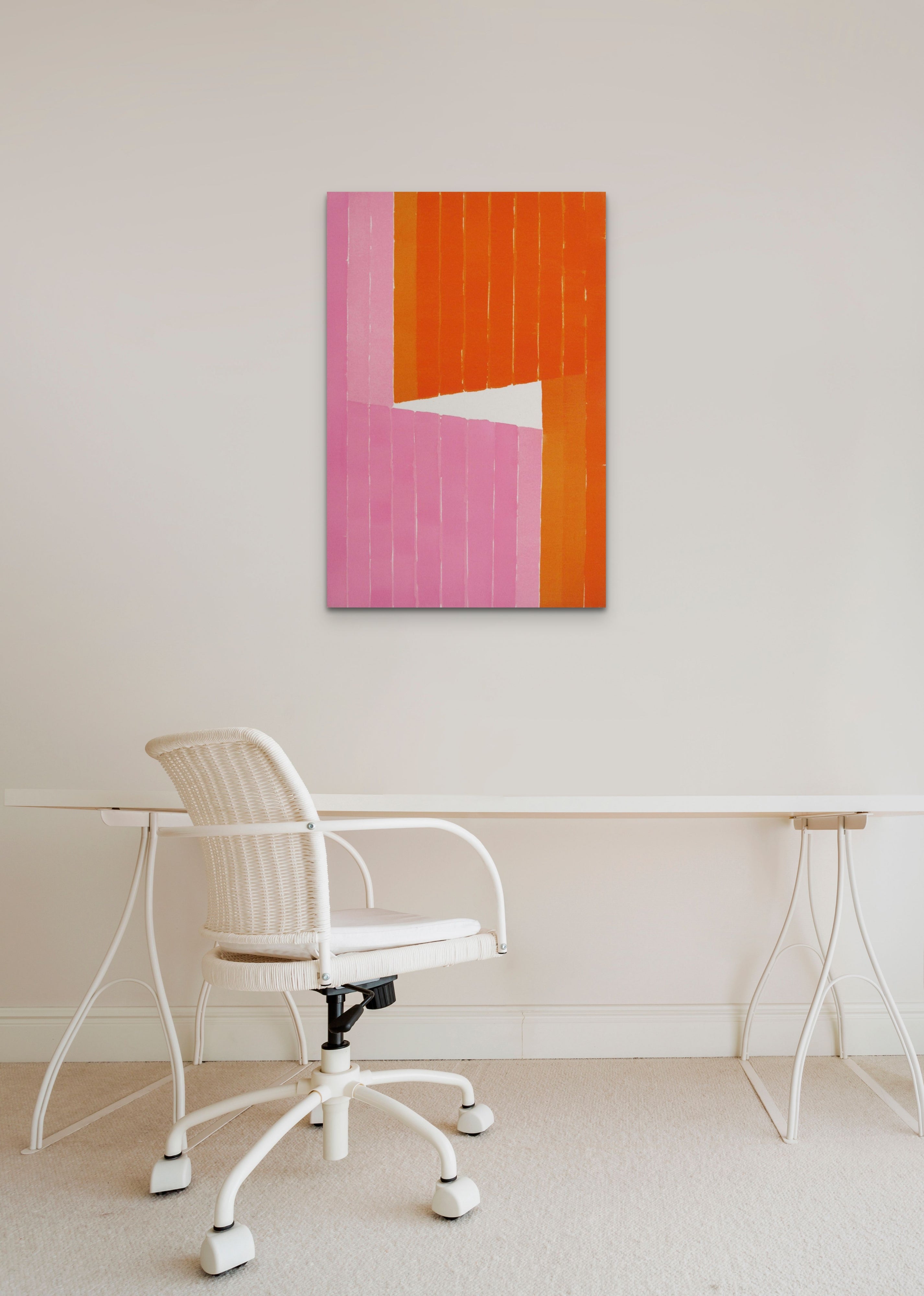 an orange and pink painting on a white wall