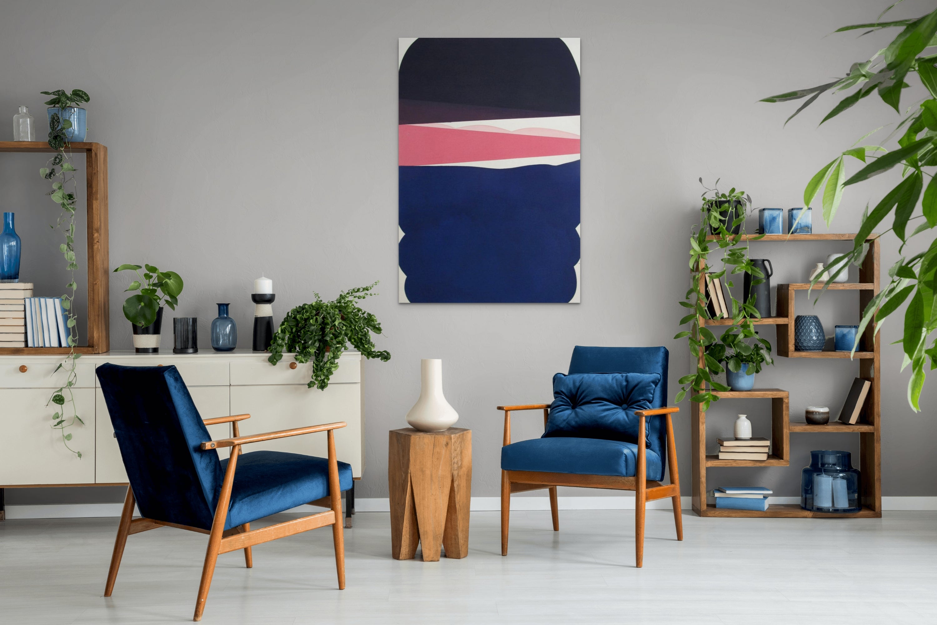 A blue and pink abstract painting on a white background.