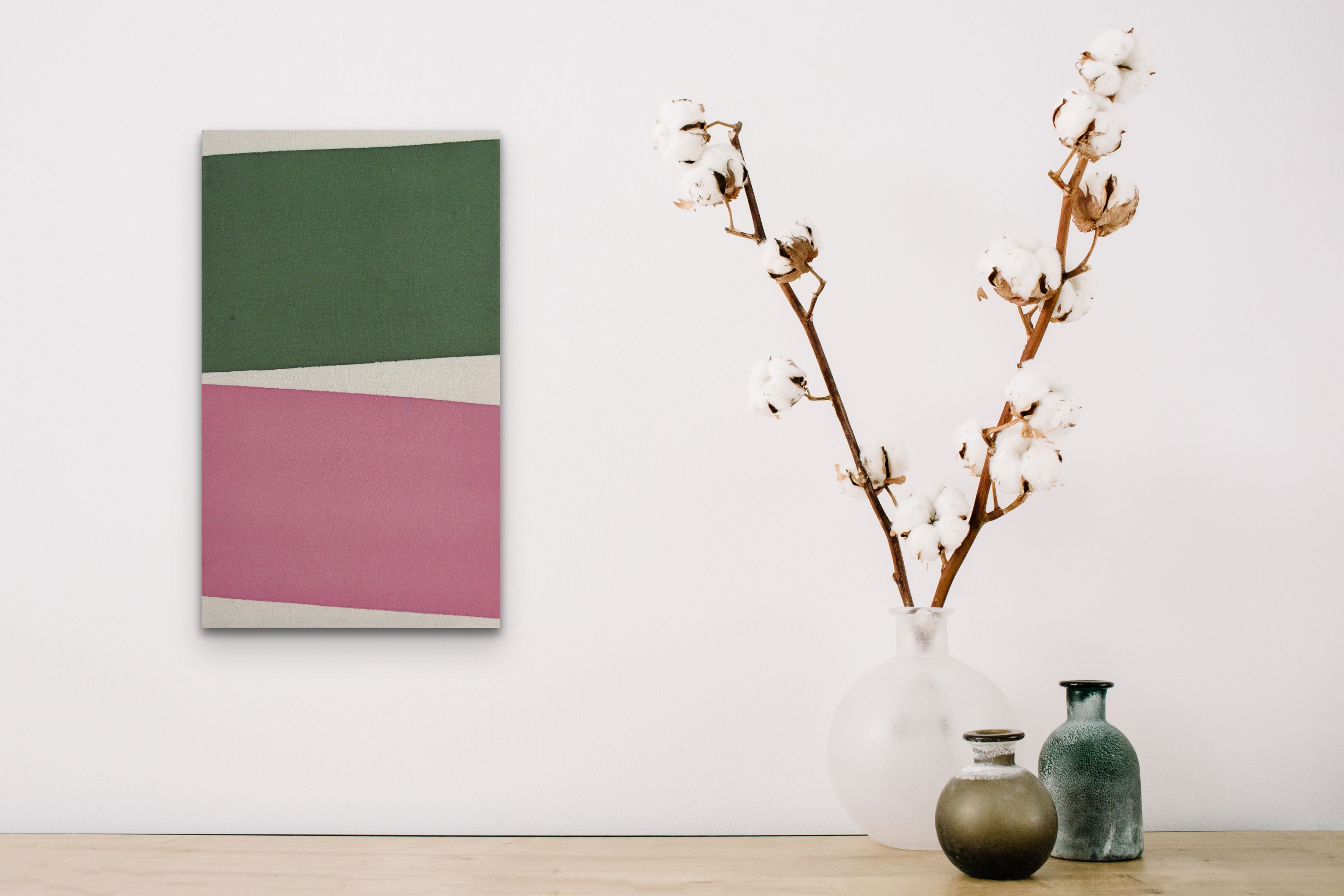 A pink and green painting on a white background.