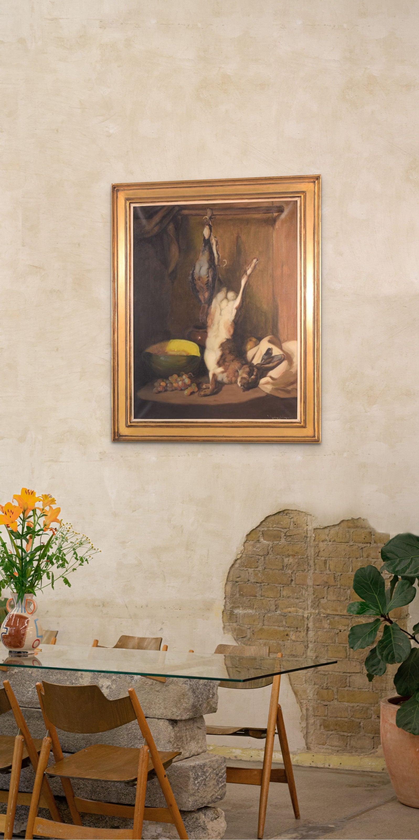 A painting of a rabbit hanging from a hook next to a bowl of fruit.