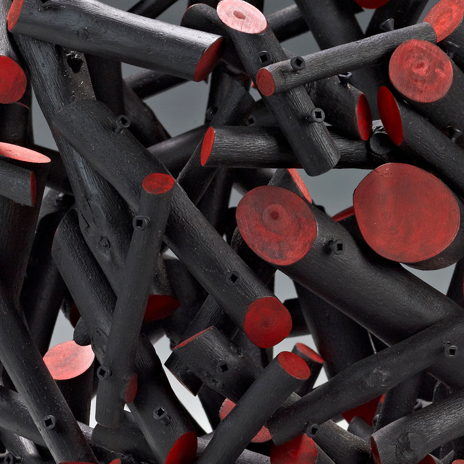 A sculpture of a heart made out of sticks. 