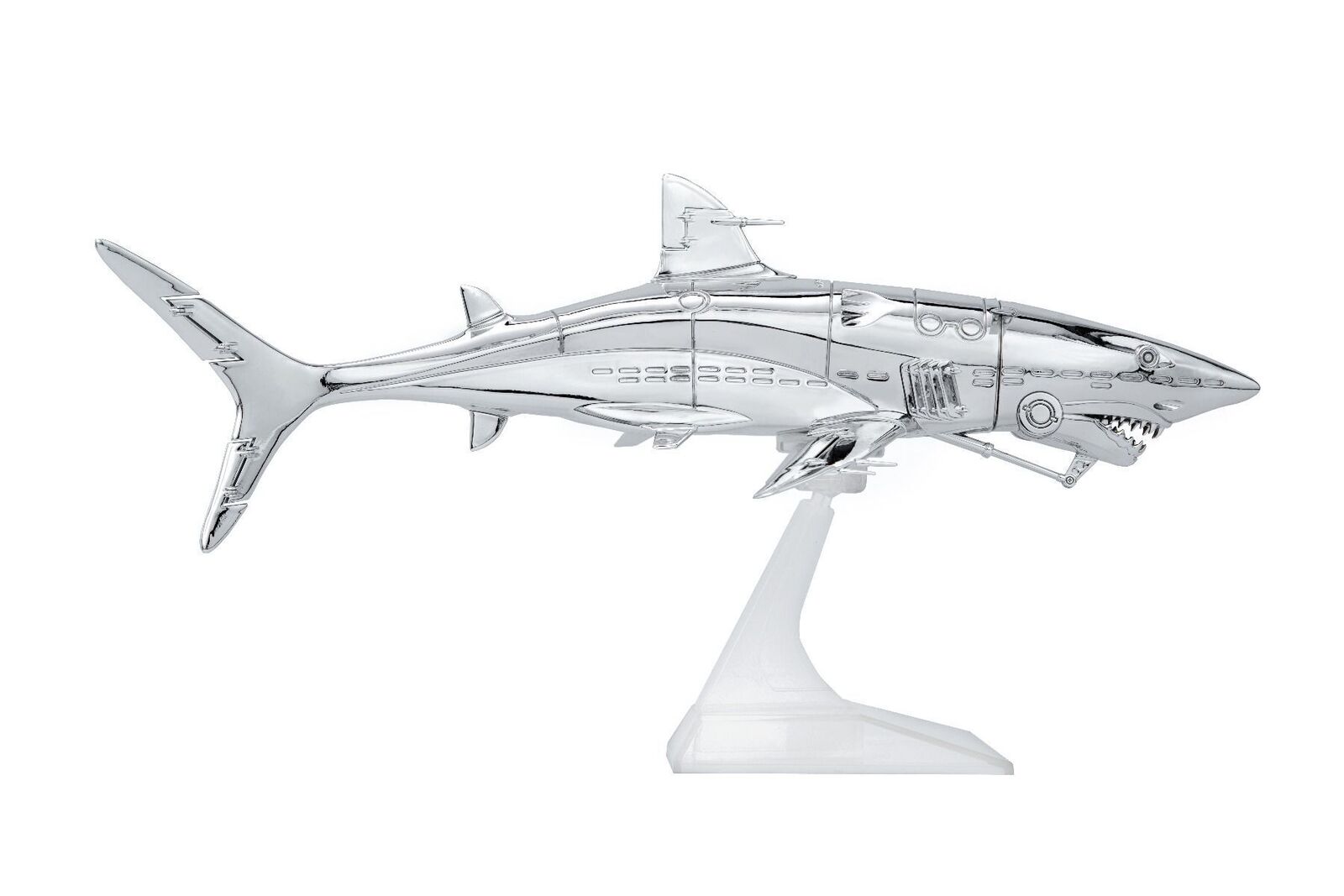 A silver model of a shark on a white background.