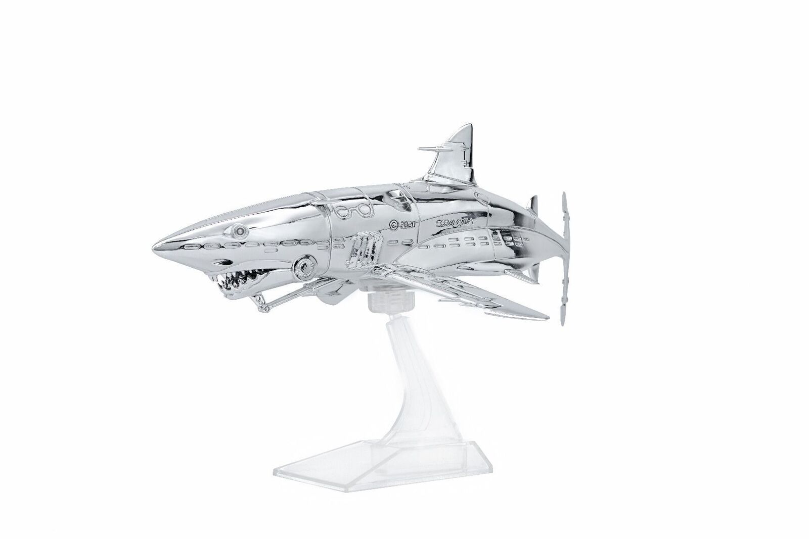 A silver model of a shark on a white background.