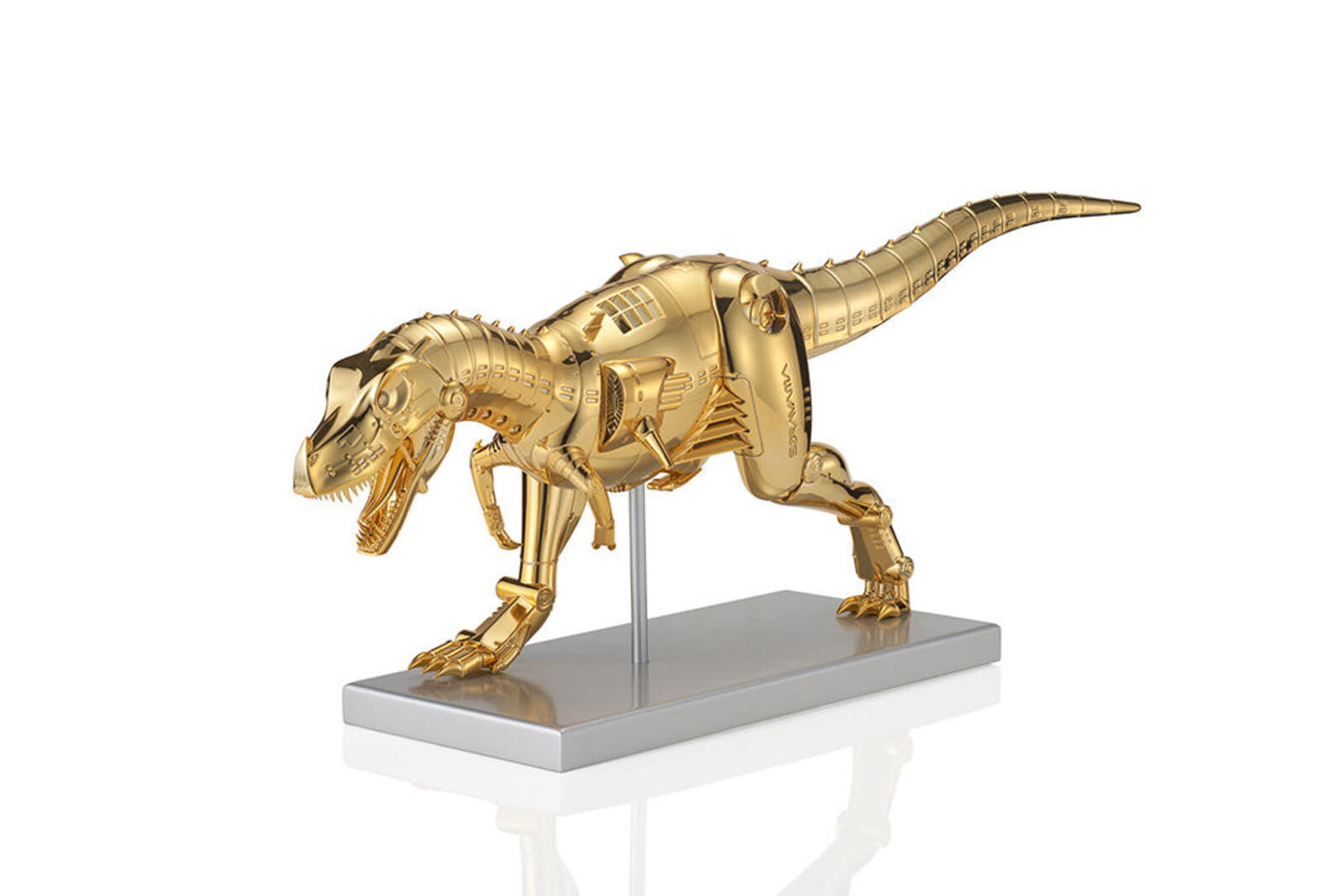 A gold model of a t-rex on a white background.