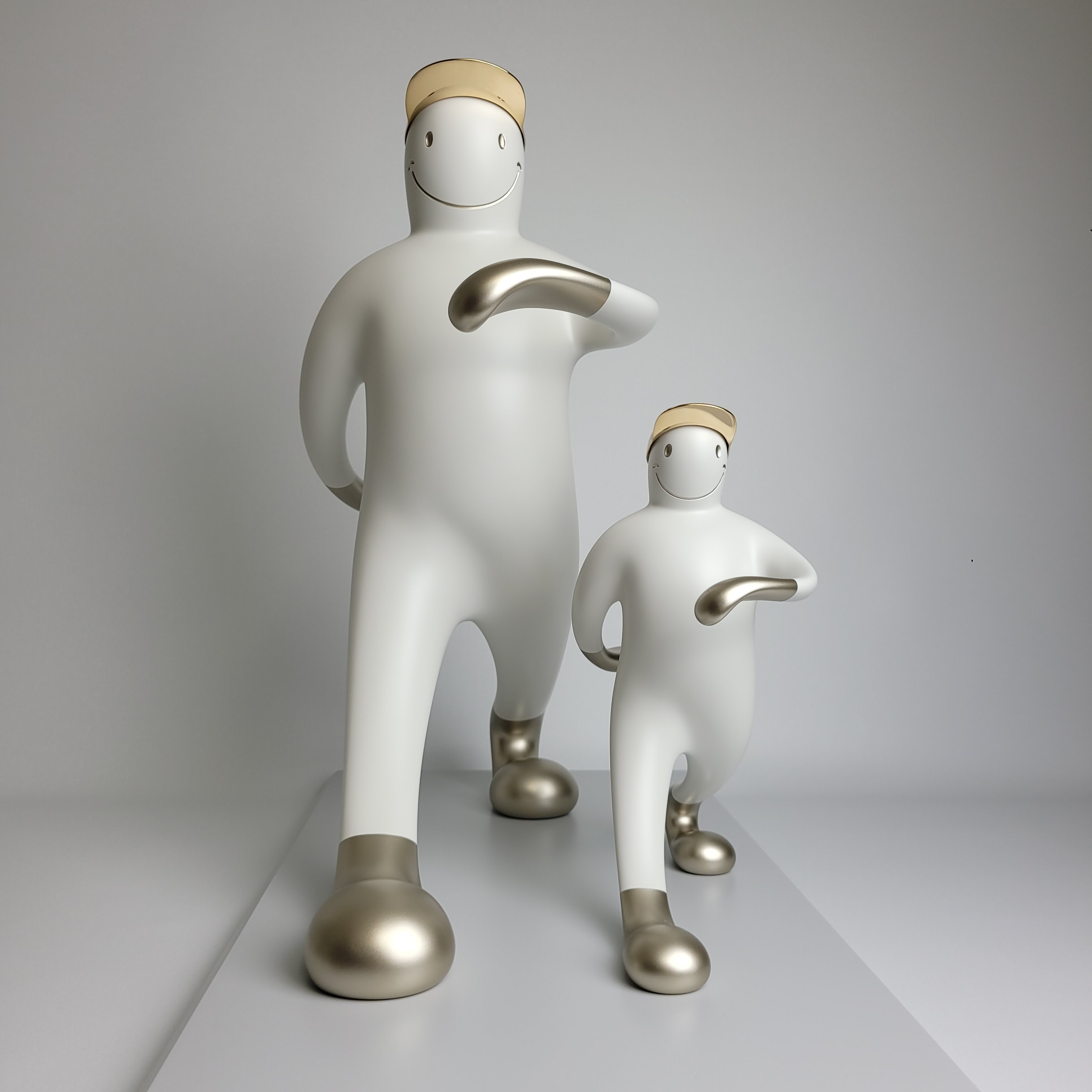 A playful sculpture of two figures in a matching pose, featuring smooth white forms with metallic accents.