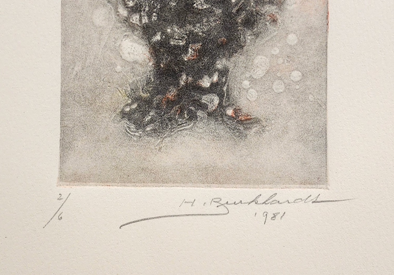 A drawing of a woman's head on a piece of paper.