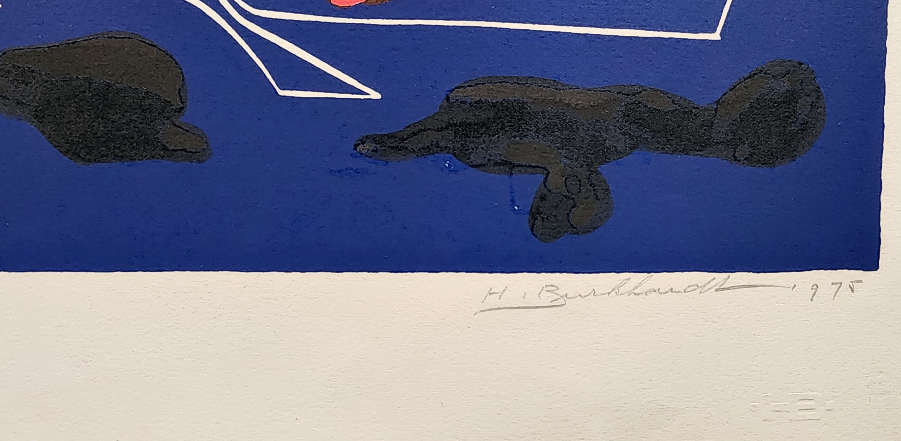 A blue and red painting on a white wall.