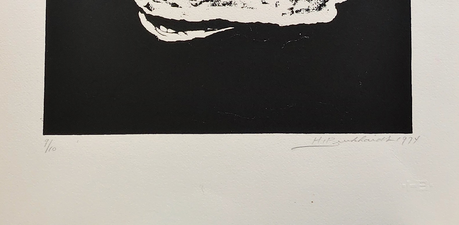 A black and white drawing of a woman sitting on a rock.