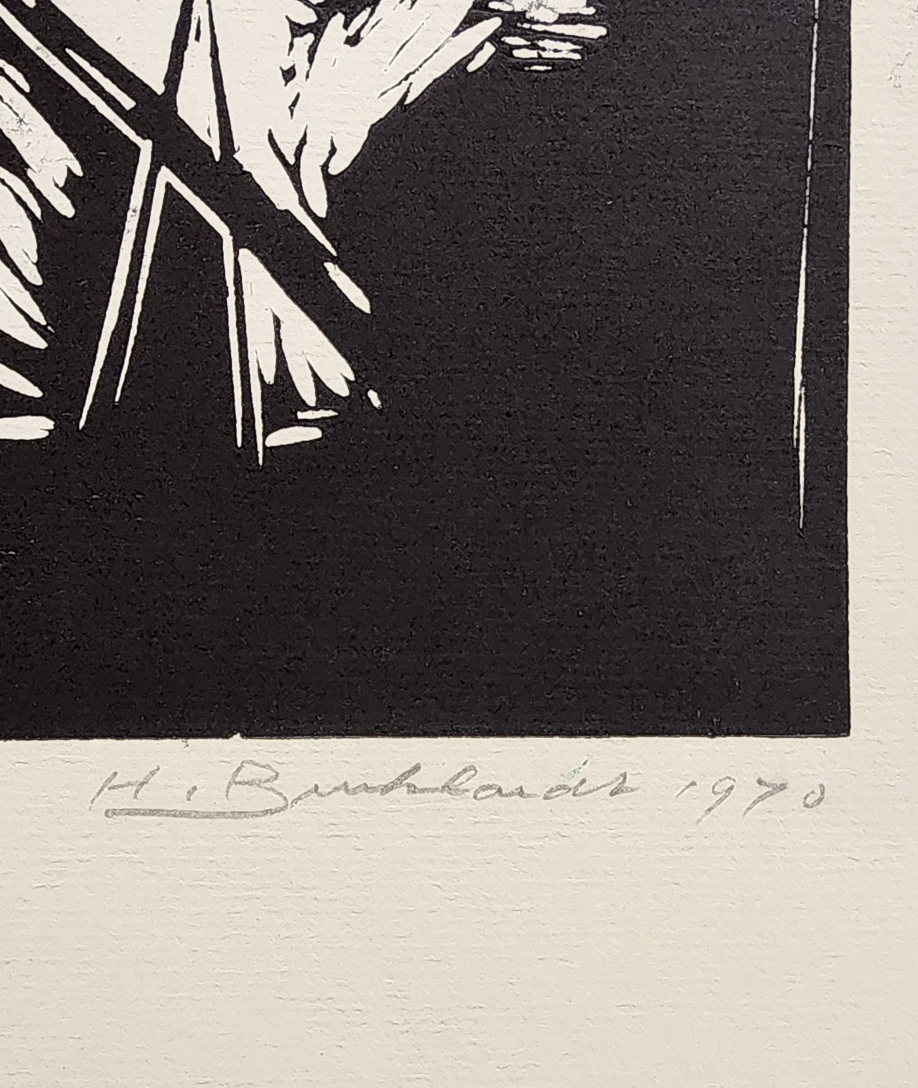 A black and white drawing of a man playing a guitar.