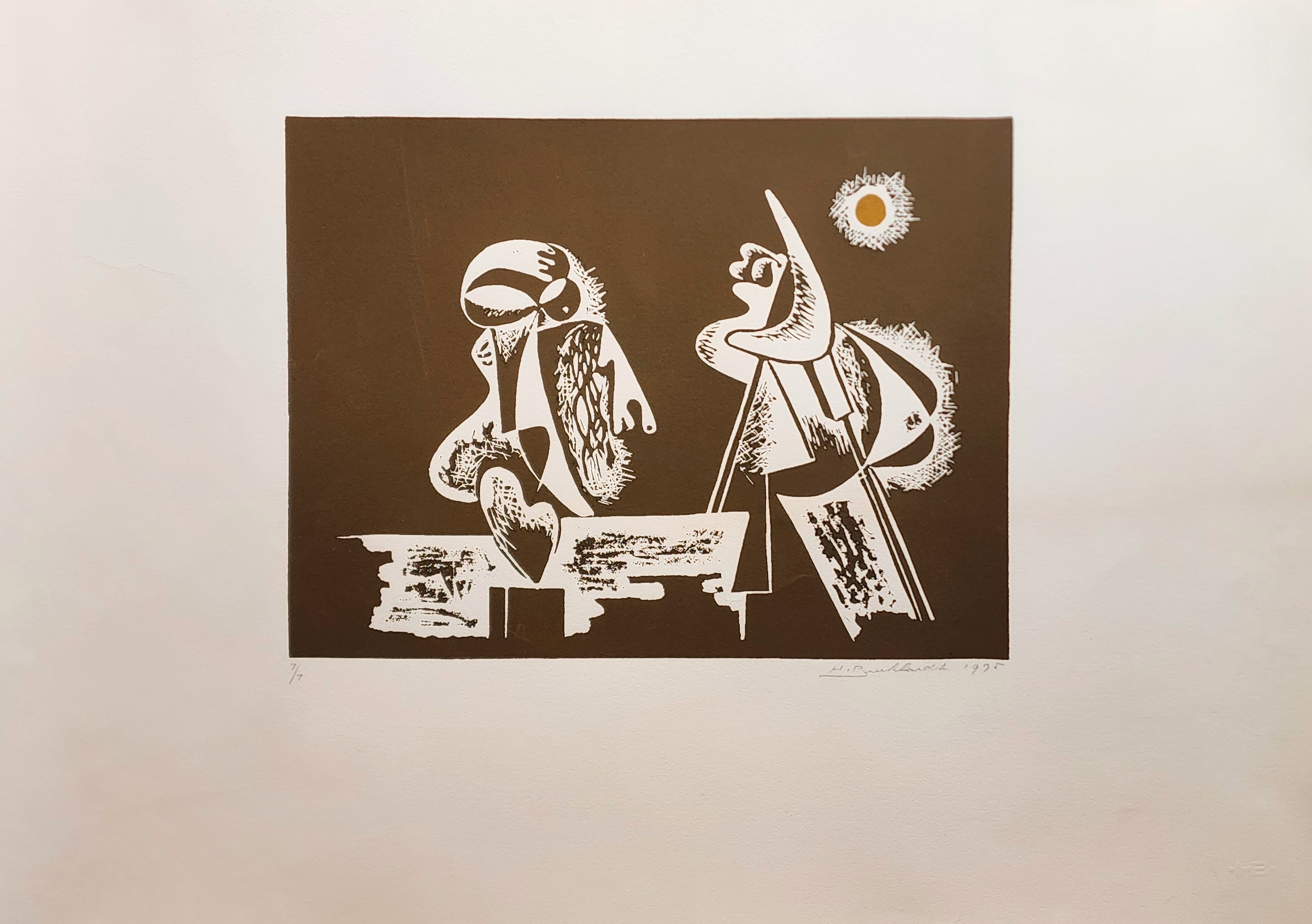 A brown and white print of a man and a woman sitting at a table.