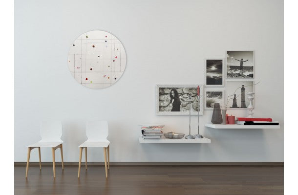 A white circle with a grid of dots on it.