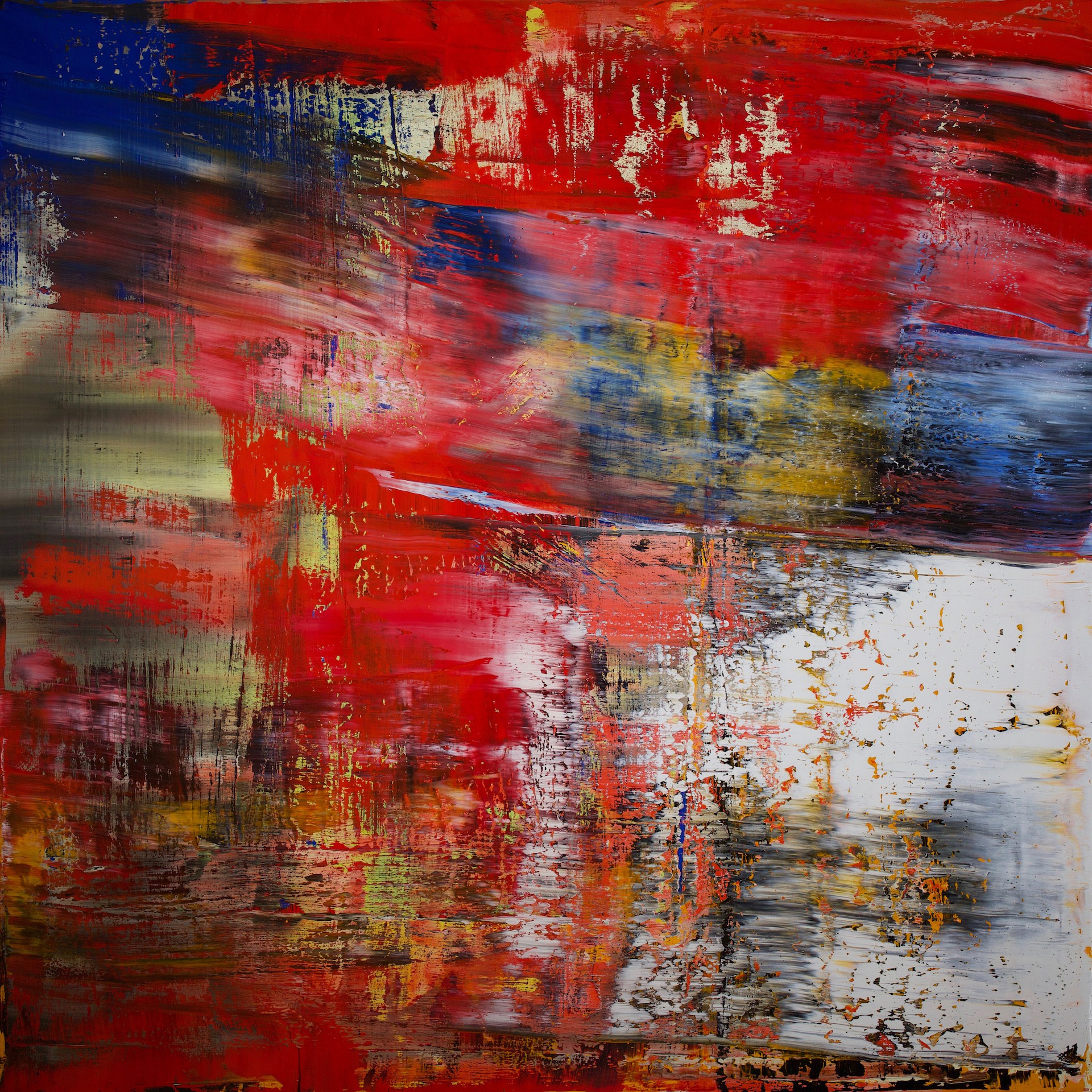 A large abstract painting with red, blue, yellow, and white colors.