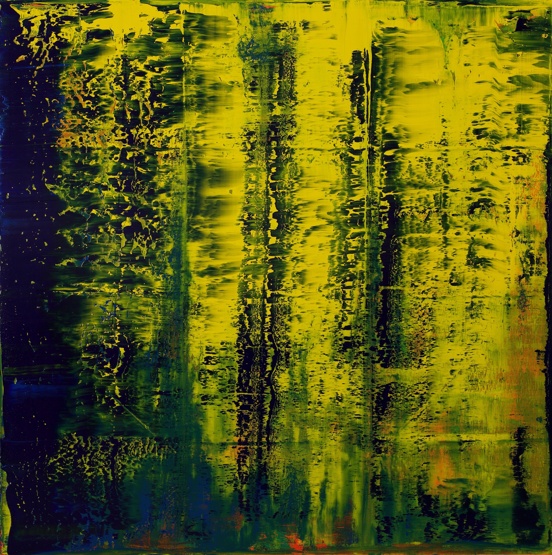 A painting with yellow and green paint on a black background.