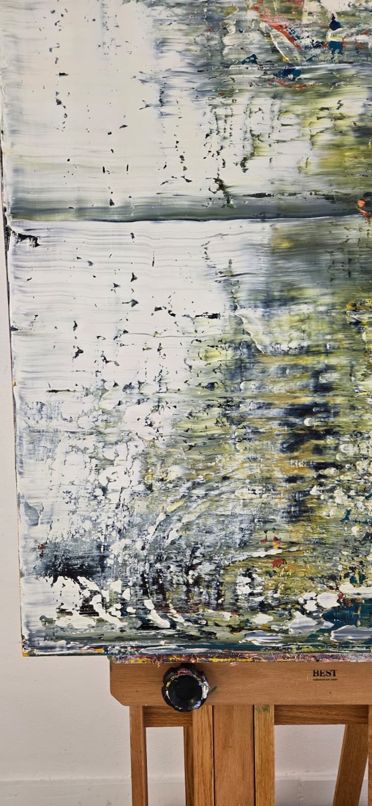 An abstract expressionist painting featuring a textured, layered composition of muted greens, whites, and splashes of vibrant color.
