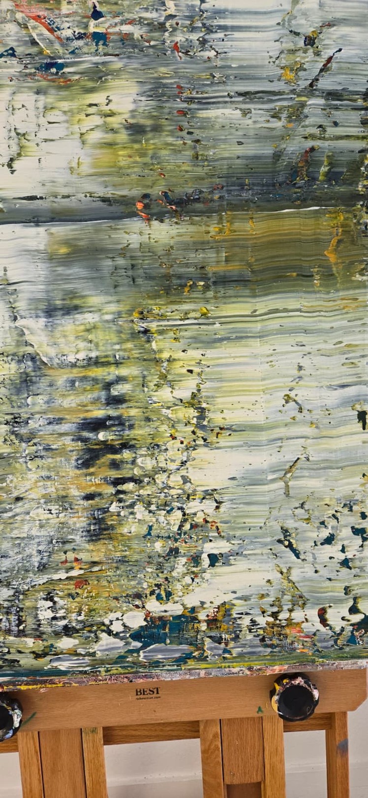 An abstract expressionist painting featuring a textured, layered composition of muted greens, whites, and splashes of vibrant color.